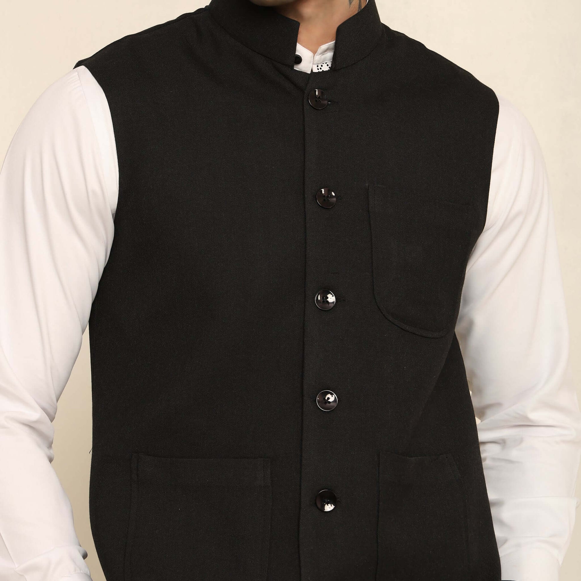 Black Pashmina Nehru Jacket for Men which has classic 3-pocket design. Perfect mens black formal nehru jacket for male by Crease India.