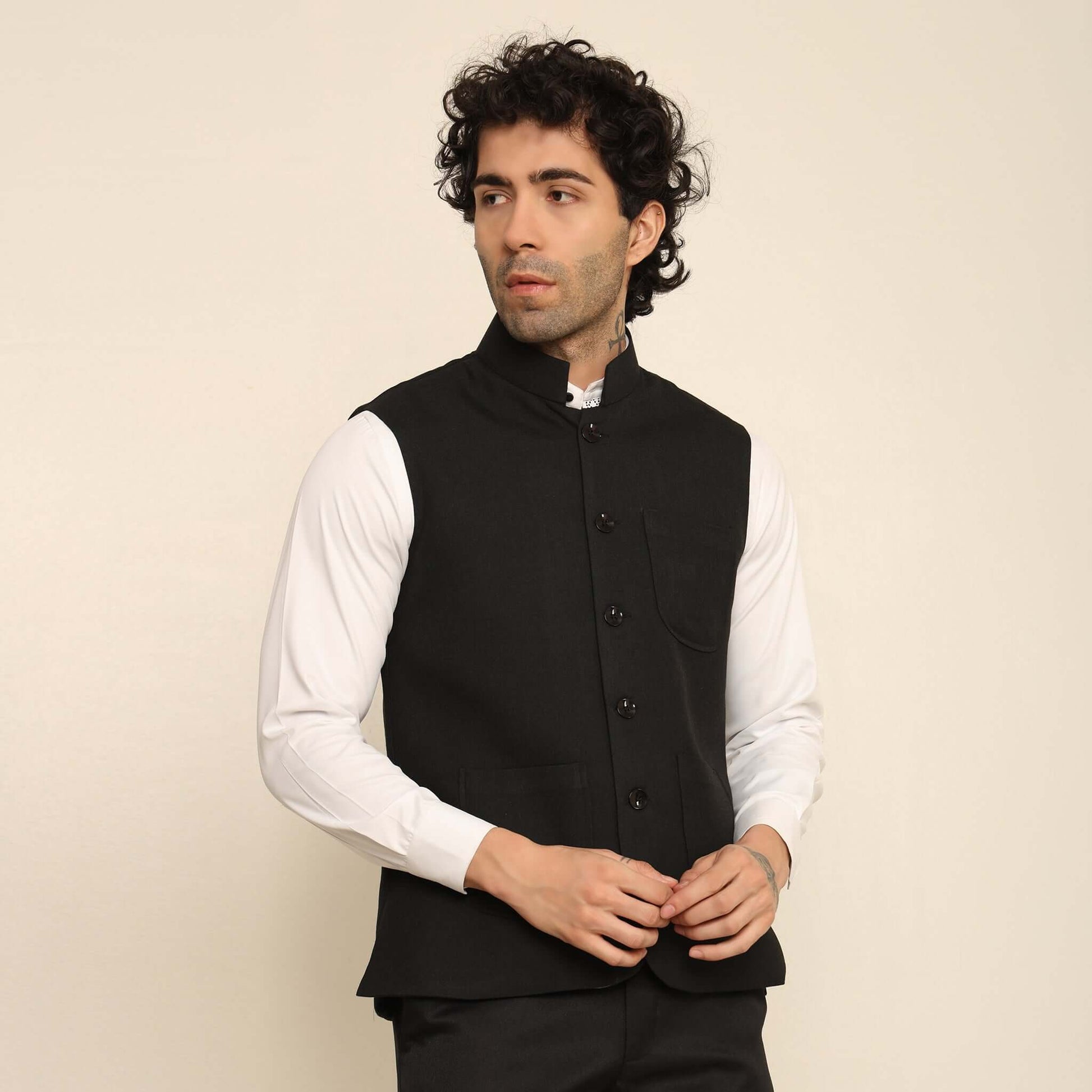 Black Pashmina Nehru Jacket for Men which has classic 3-pocket design. Perfect mens black formal nehru jacket for male by Crease India.