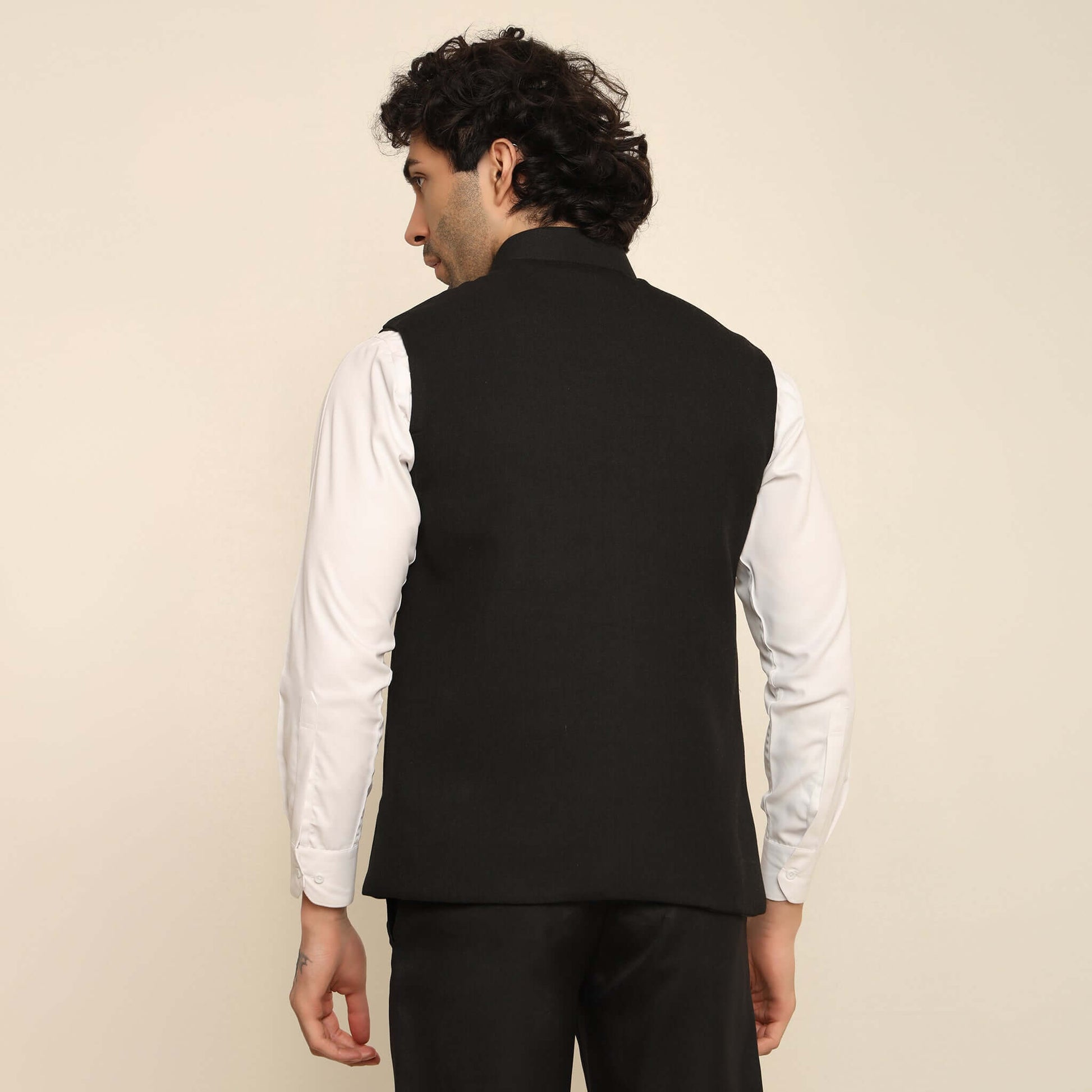 Black Pashmina Nehru Jacket for Men which has classic 3-pocket design. Perfect mens black formal nehru jacket for male by Crease India.