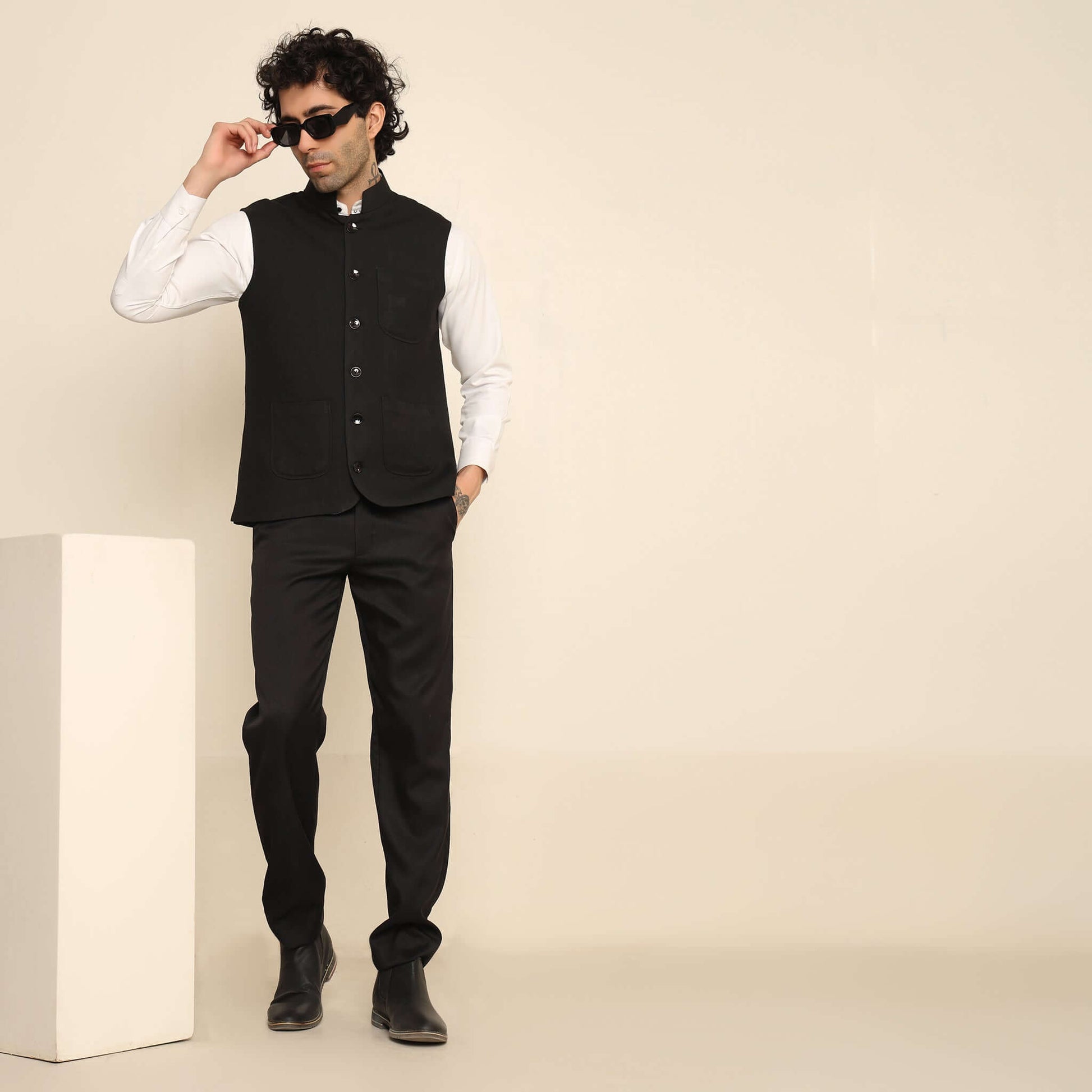 Black Pashmina Nehru Jacket for Men which has classic 3-pocket design. Perfect mens black formal nehru jacket for male by Crease India.