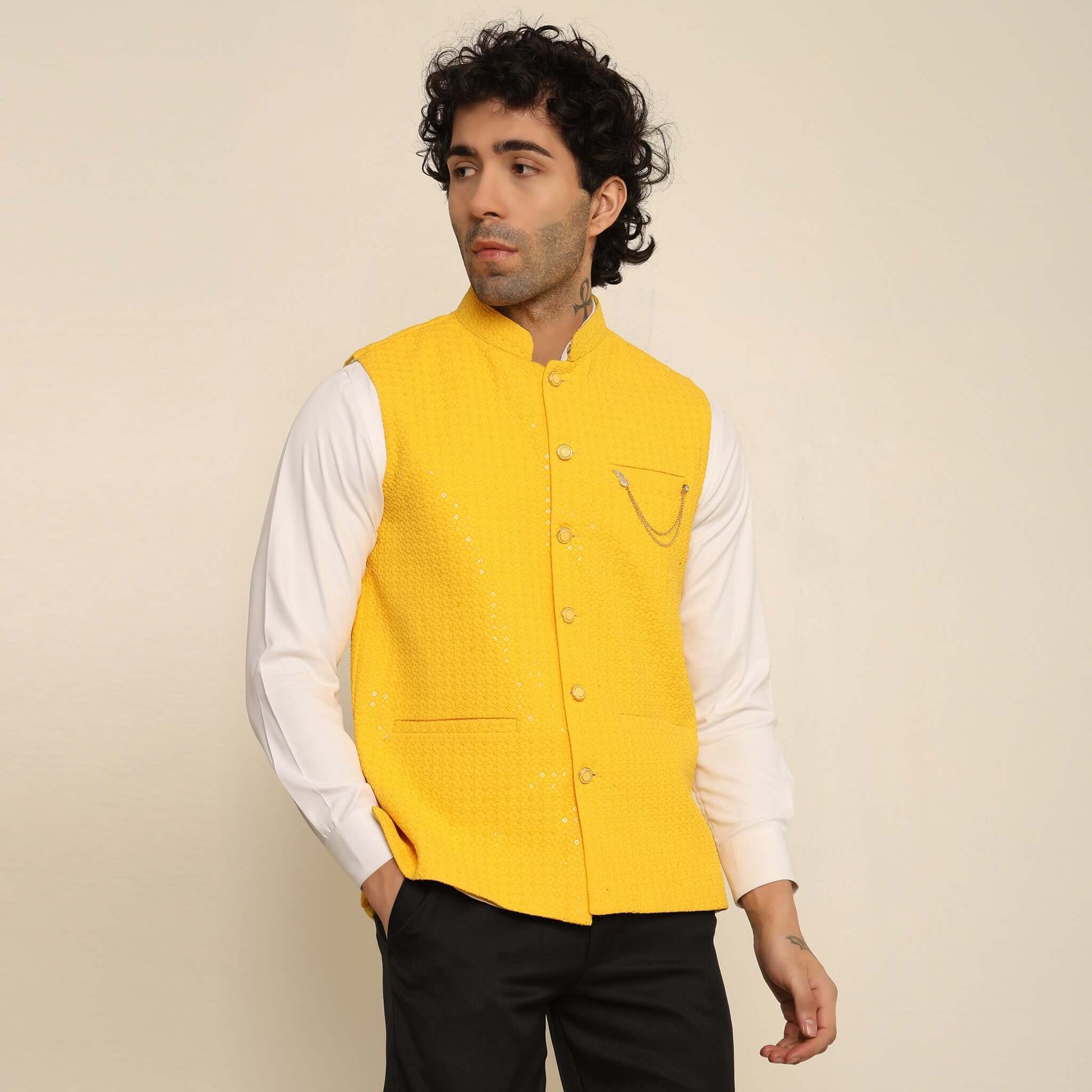 Yellow Sequins Embellished Chikankari Nehru Jacket which has chikankari and sequins work. Perfect mens yellow wedding nehru jacket for male by Crease India.