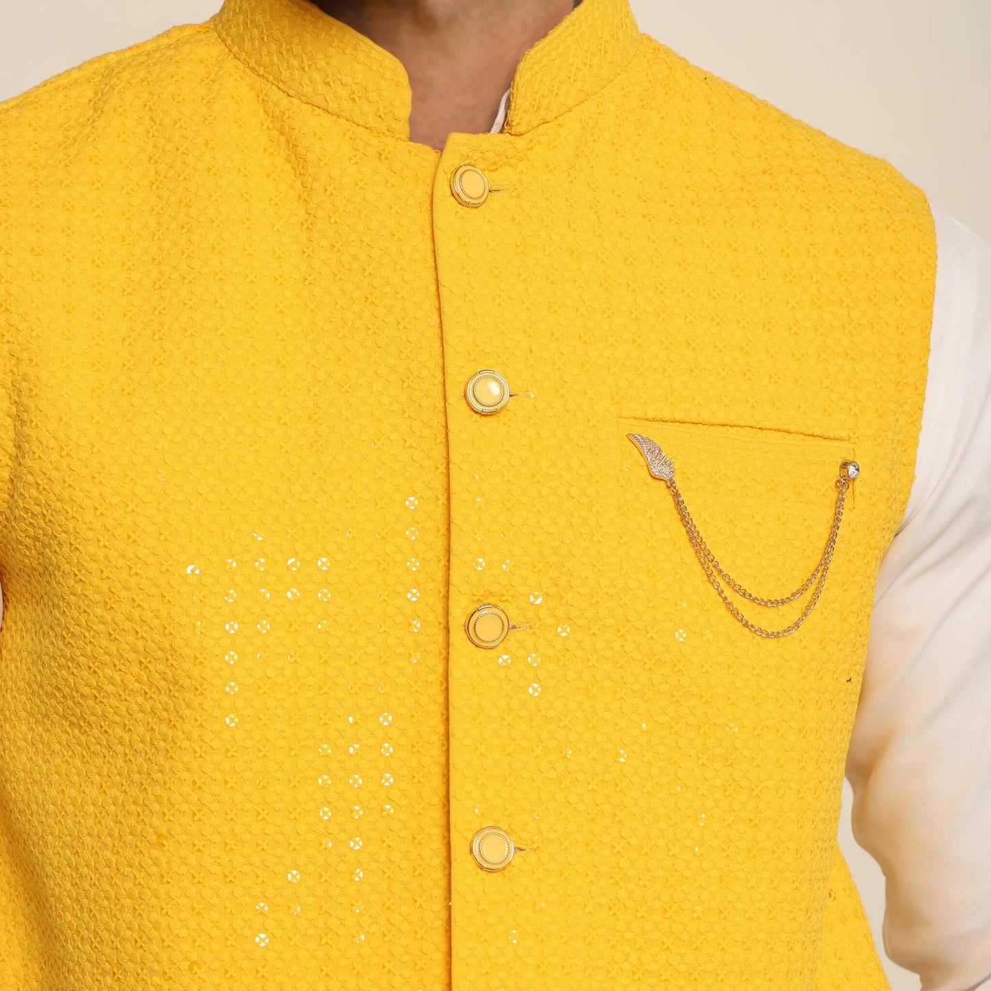 Yellow Sequins Embellished Chikankari Nehru Jacket which has chikankari and sequins work. Perfect mens yellow wedding nehru jacket for male by Crease India.