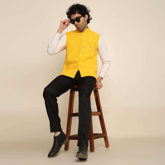 Yellow Sequins Embellished Chikankari Nehru Jacket which has chikankari and sequins work. Perfect mens yellow wedding nehru jacket for male by Crease India.