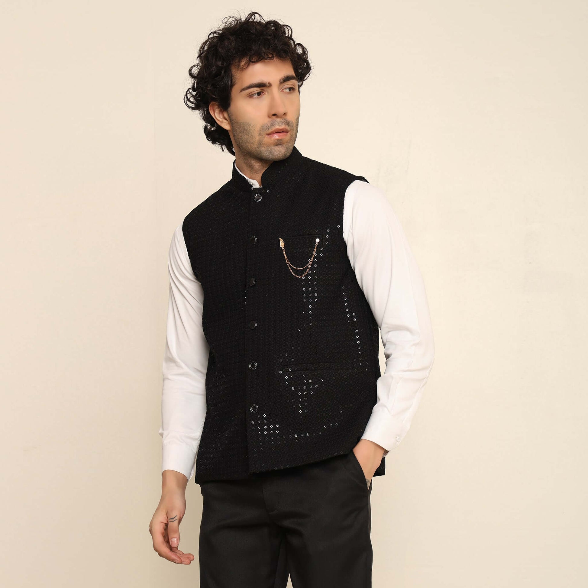 Black Sequins Embellished Chikankari Nehru Jacket which has chikankari and sequins work. Perfect mens black wedding nehru jacket for male by Crease India.