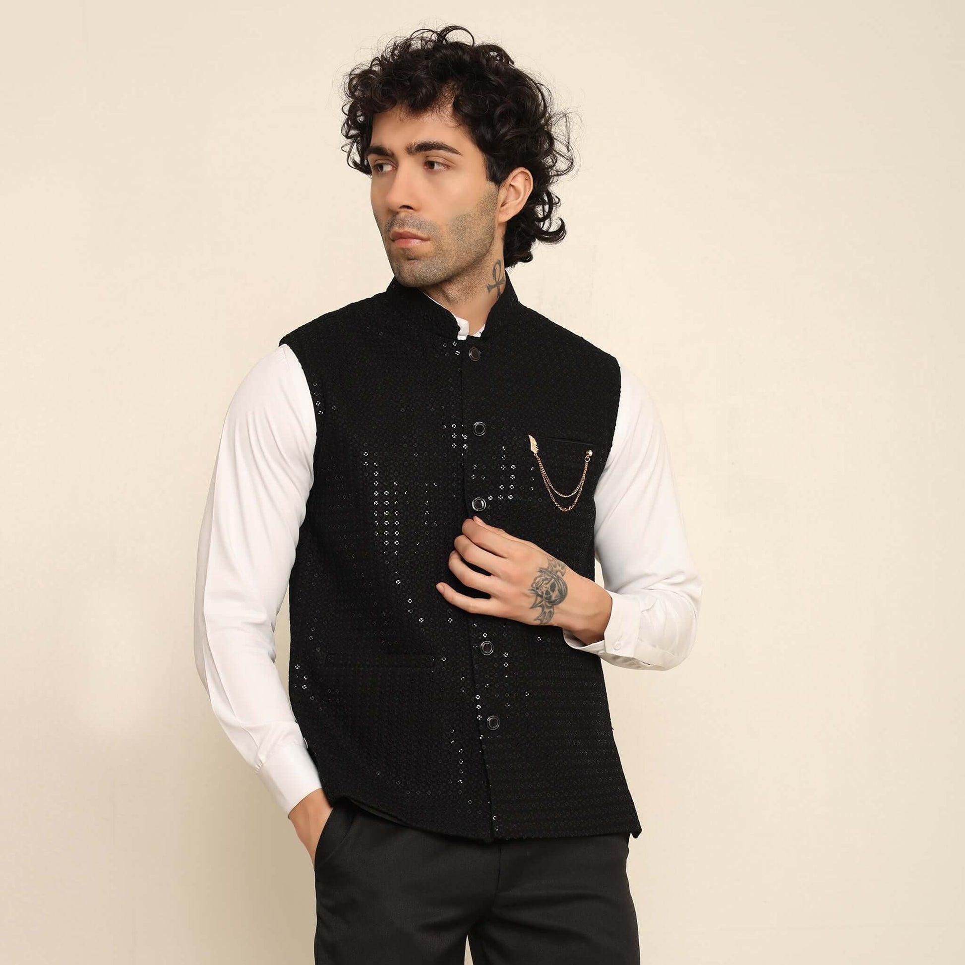 Black Sequins Embellished Chikankari Nehru Jacket which has chikankari and sequins work. Perfect mens black wedding nehru jacket for male by Crease India.