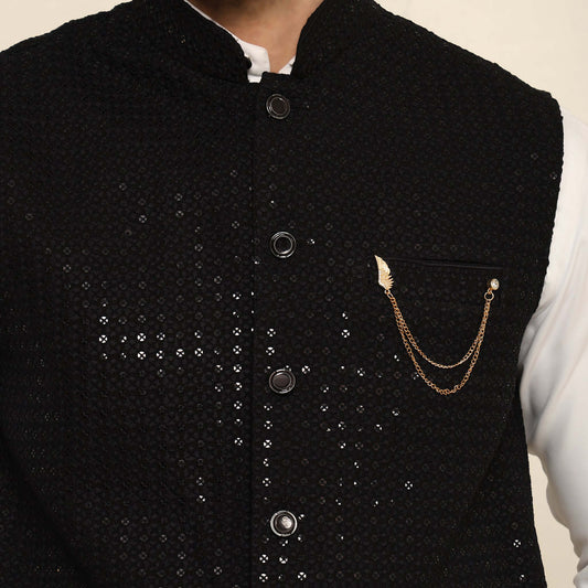 Black Sequins Embellished Chikankari Nehru Jacket which has chikankari and sequins work. Perfect mens black wedding nehru jacket for male by Crease India.