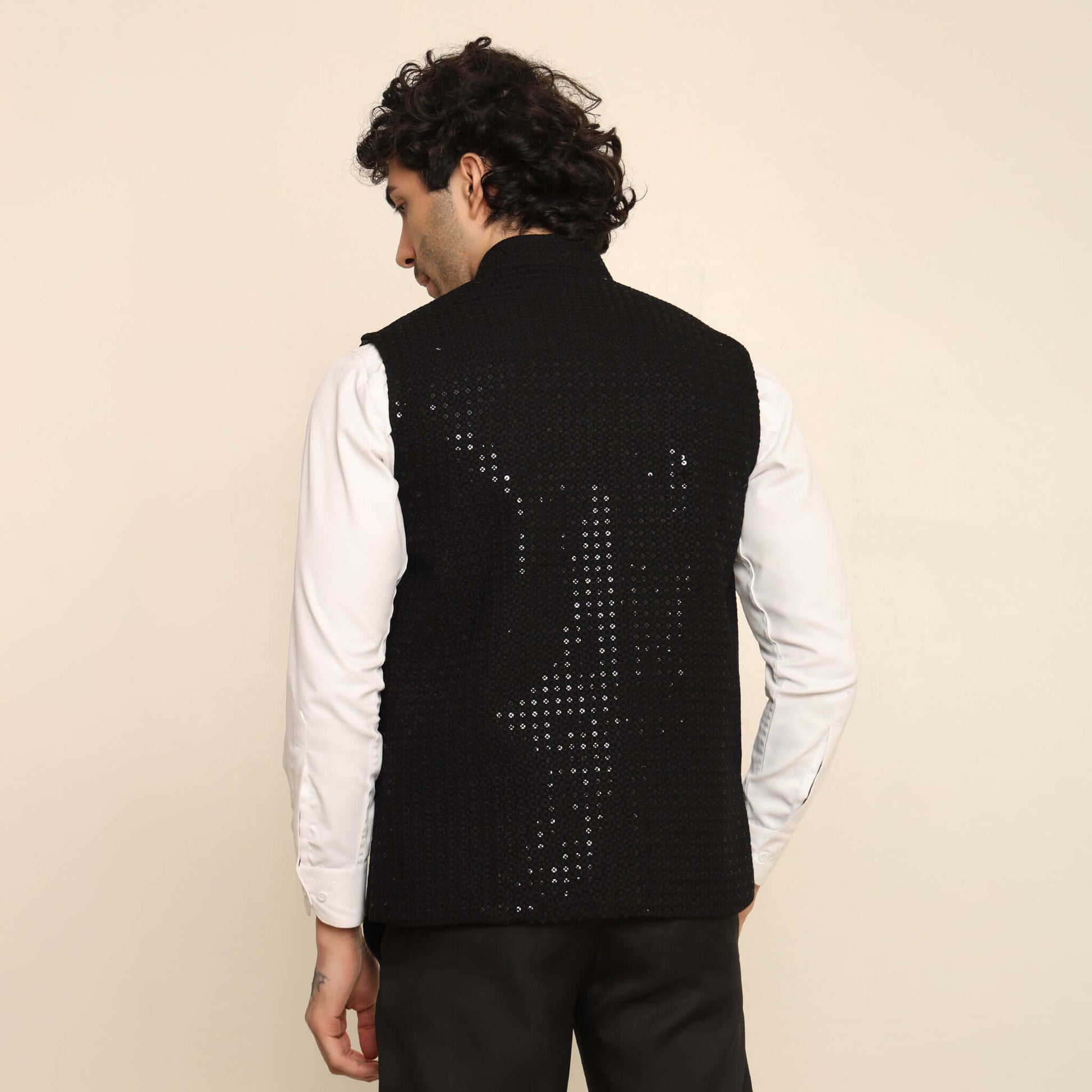 Black Sequins Embellished Chikankari Nehru Jacket which has chikankari and sequins work. Perfect mens black wedding nehru jacket for male by Crease India.