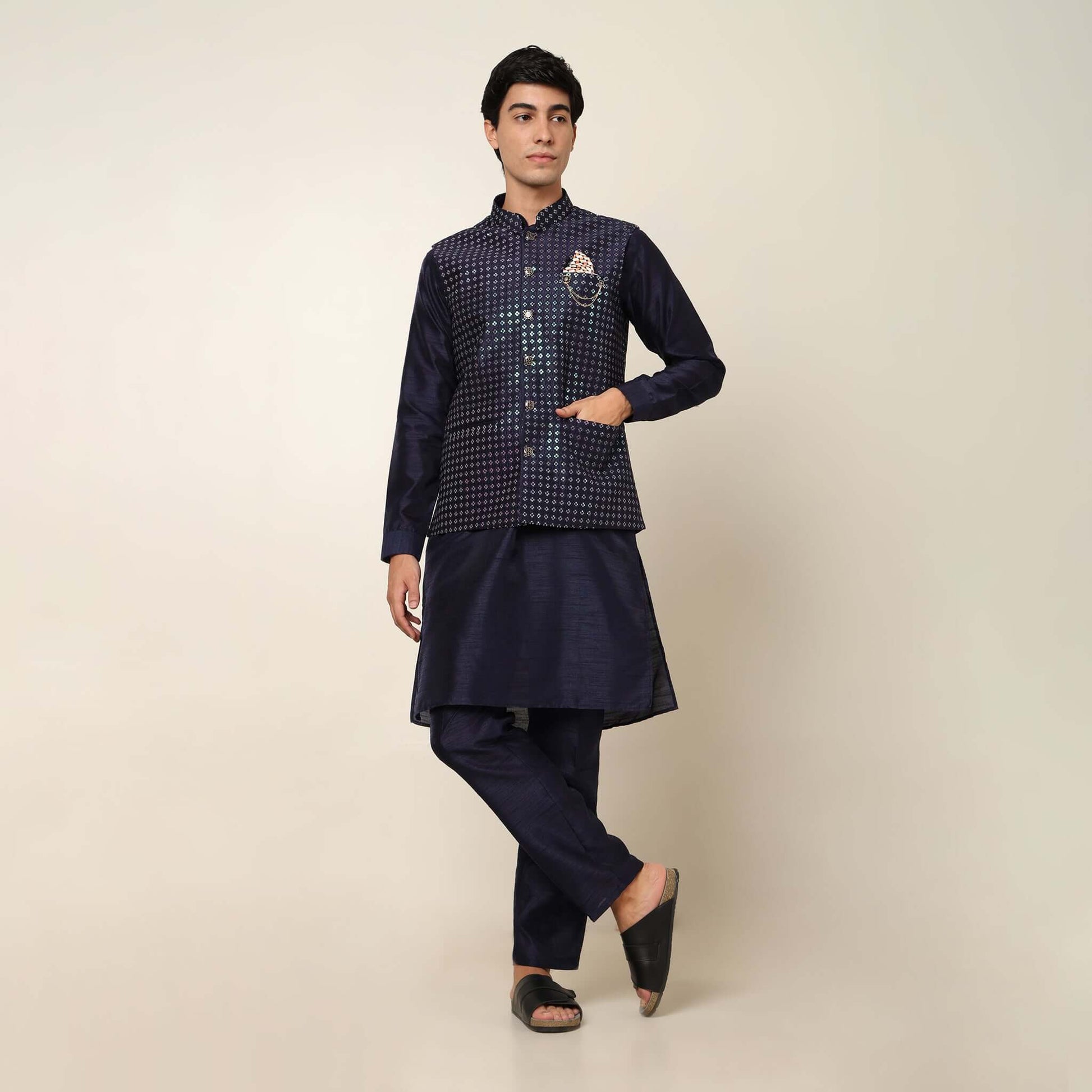 Evening Blue kurta with nehru jacket for men which is made up of dupion silk and has sequence embroidery on it. Shop this evening blue designer wedding kurta jacket set for male from Crease India website.
