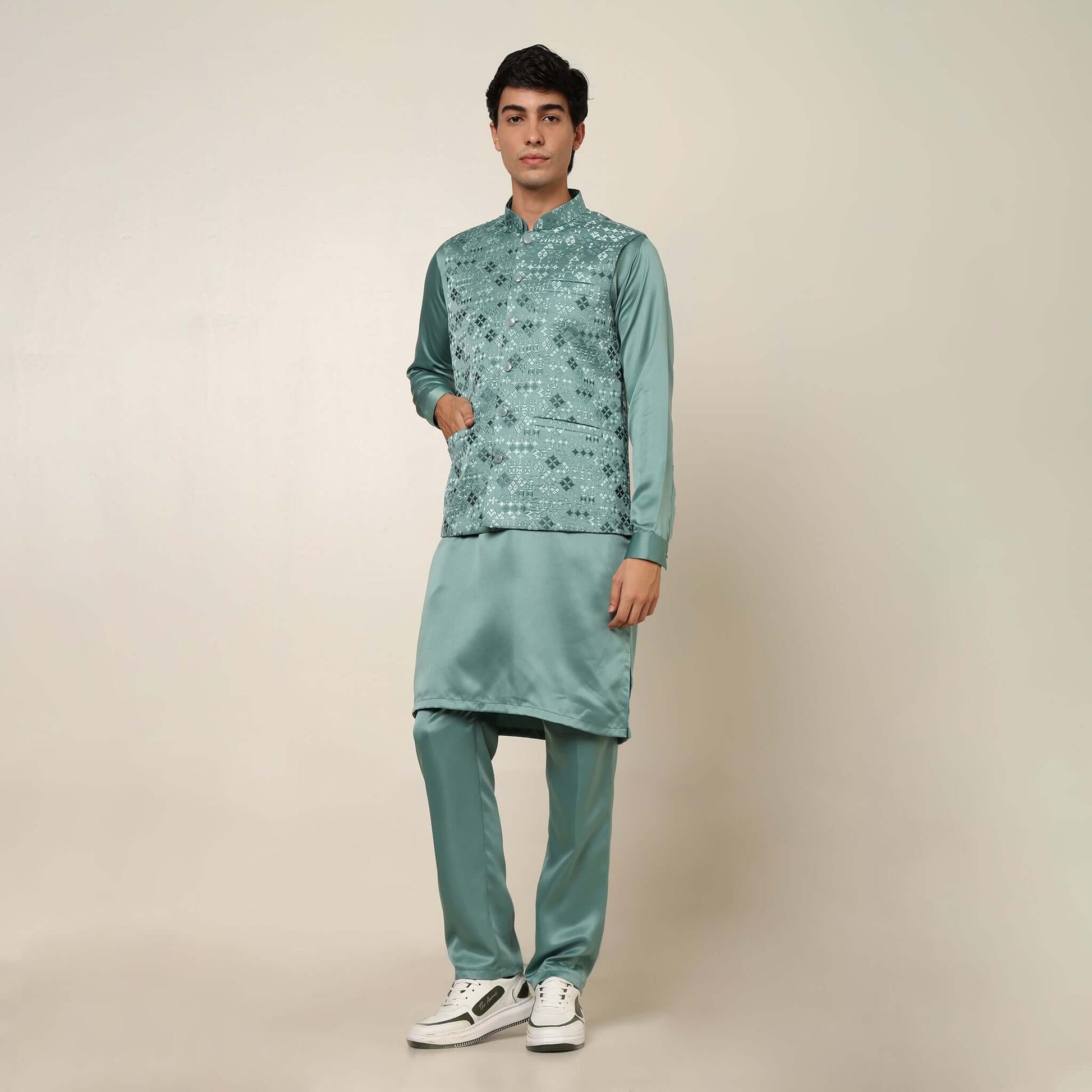 Light Sea Green kurta with nehru jacket for men which is made up of satin and has embroidery on it. Shop this light sea green designer wedding kurta jacket set for male from Crease India website.