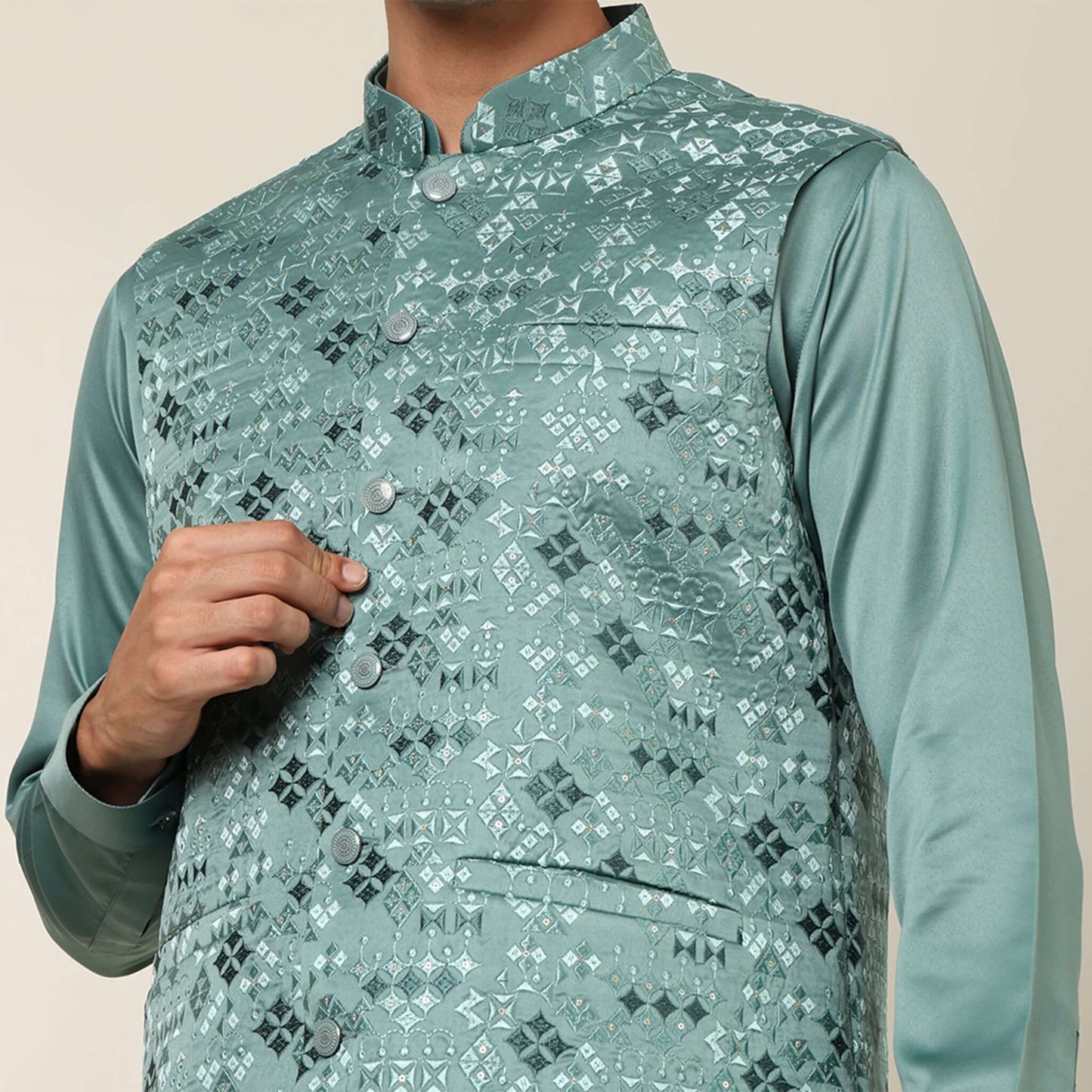 Light Sea Green kurta with nehru jacket for men which is made up of satin and has embroidery on it. Shop this light sea green designer wedding kurta jacket set for male from Crease India website.