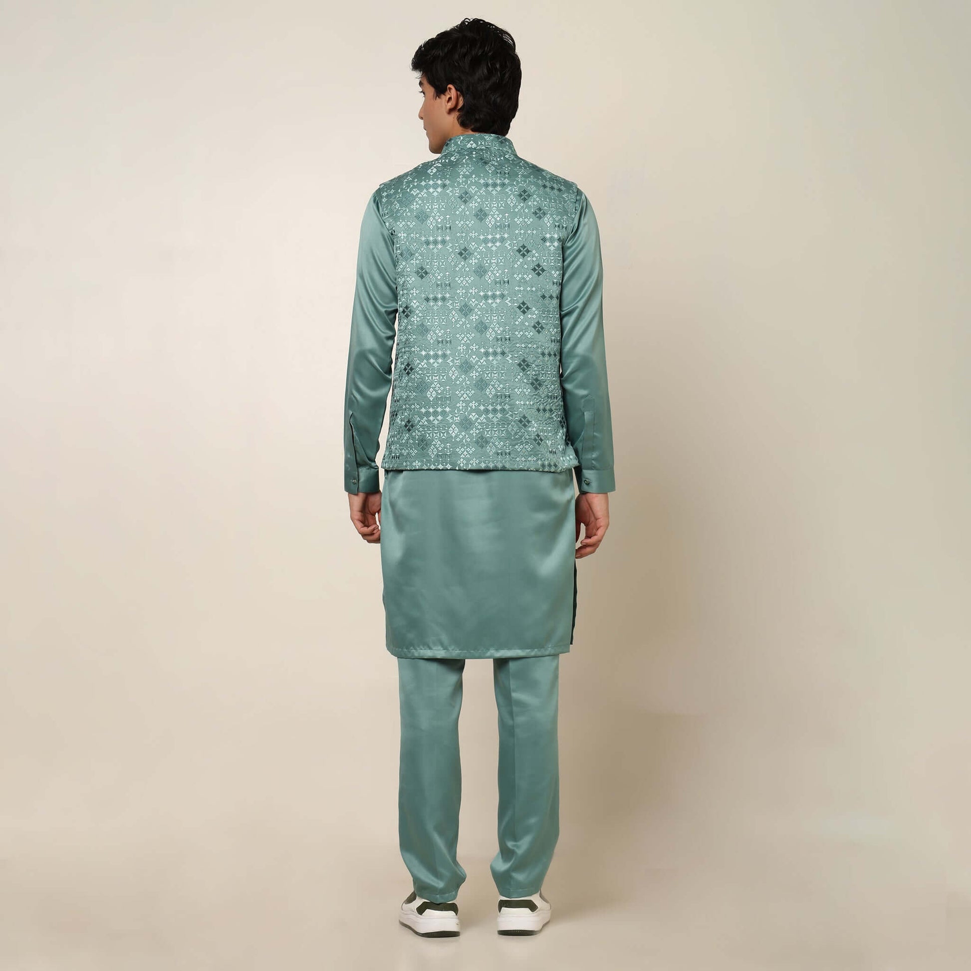 Light Sea Green kurta with nehru jacket for men which is made up of satin and has embroidery on it. Shop this light sea green designer wedding kurta jacket set for male from Crease India website.