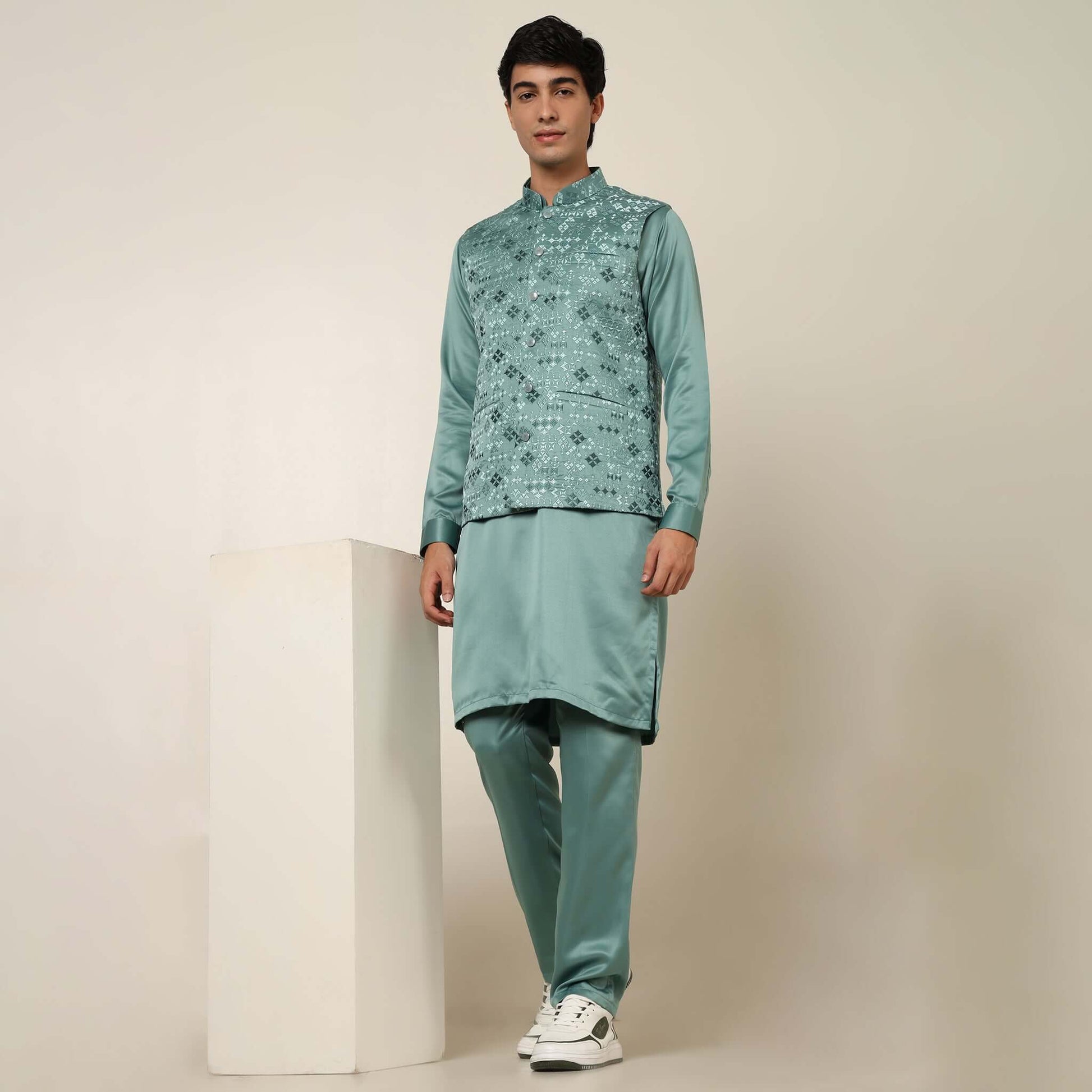 Light Sea Green kurta with nehru jacket for men which is made up of satin and has embroidery on it. Shop this light sea green designer wedding kurta jacket set for male from Crease India website.