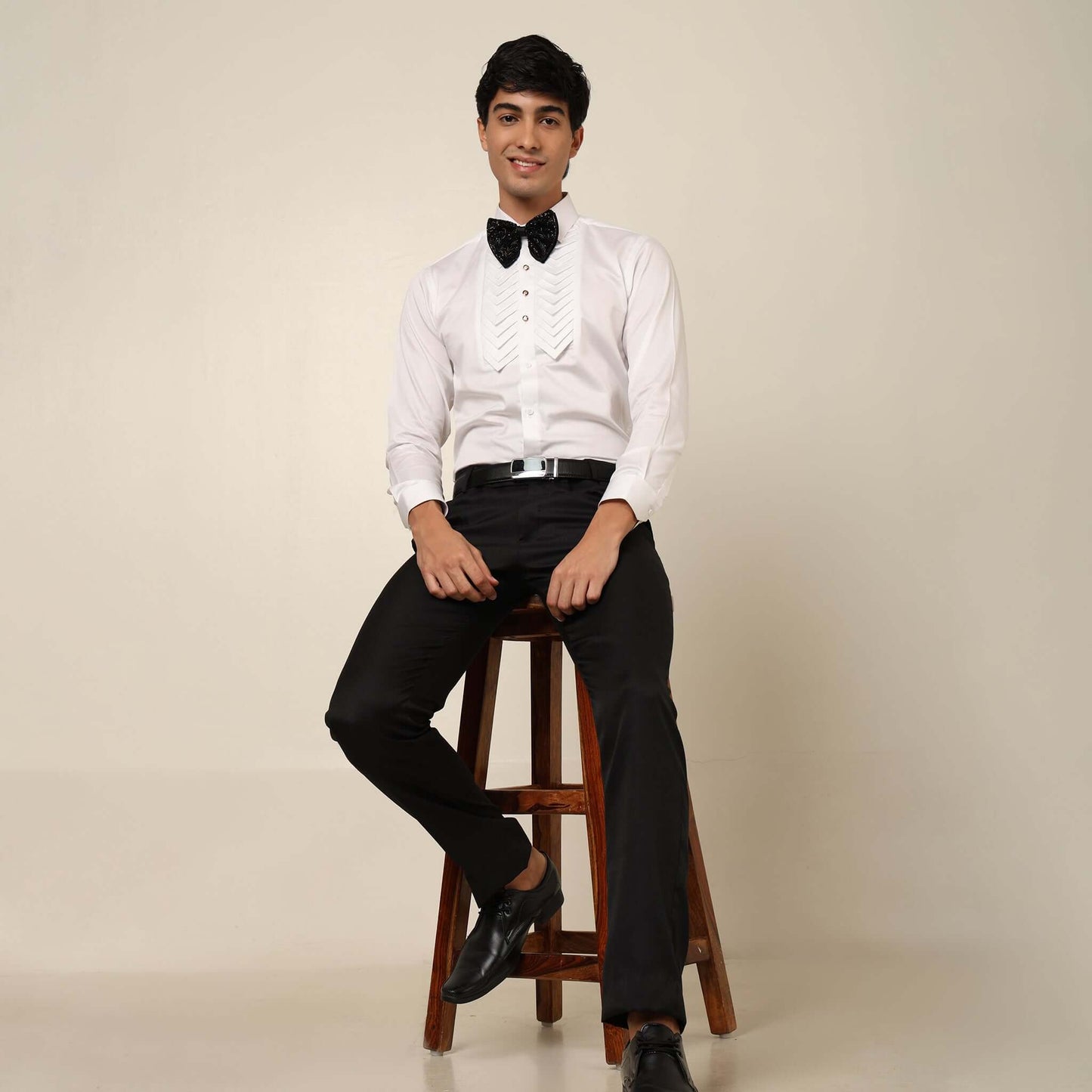 Skyline Designer White Tuxedo Shirt for Men which is made up of cotton and has pleated work at the front. Perfect designer formal wear white shirt for weddings and black tie events by Crease India.