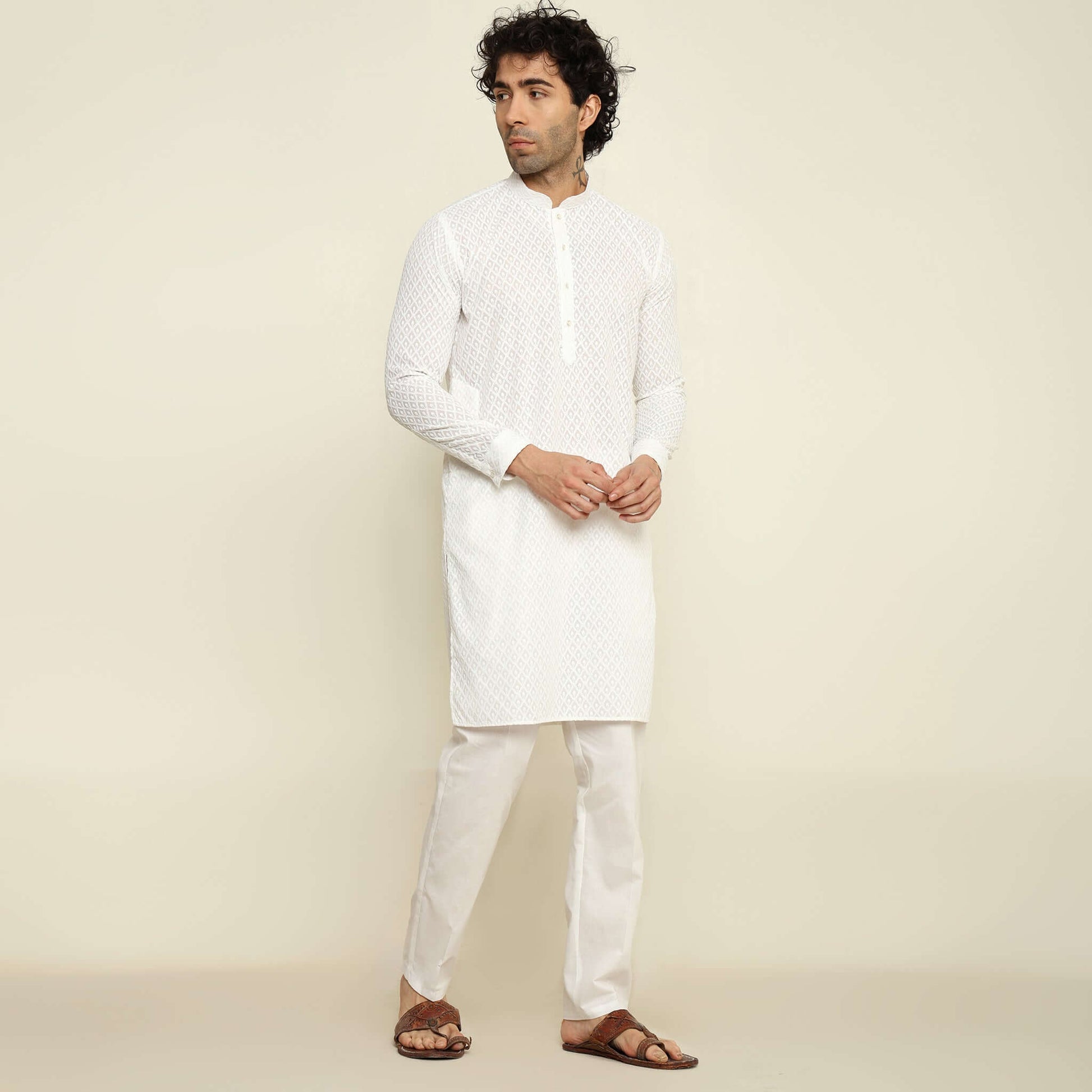 NAQSH White Chikankari Kurta for Men which has chikankari embroidery. Perfect mens white wedding kurta for male by Crease India.