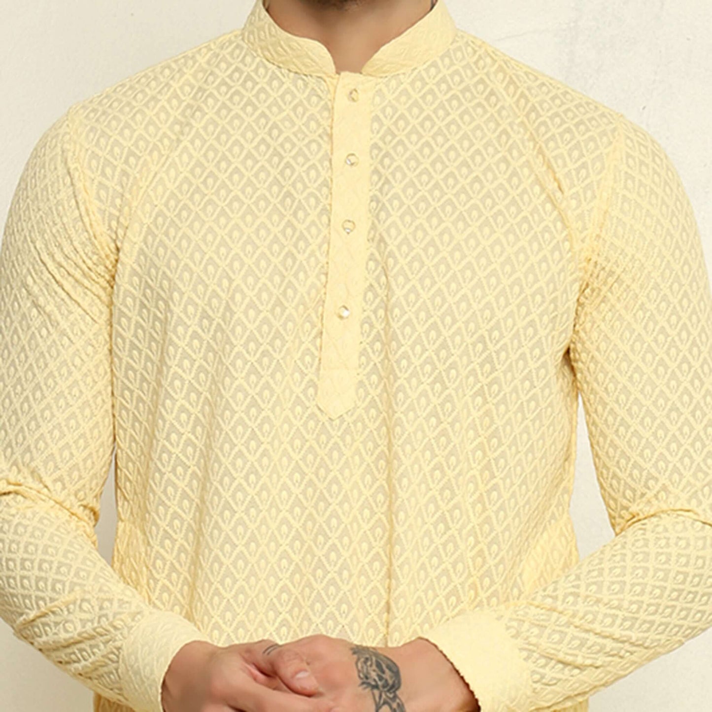 NAQSH Light Yellow Chikankari Kurta for Men which has chikankari embroidery. Perfect mens light yellow wedding kurta for male by Crease India.