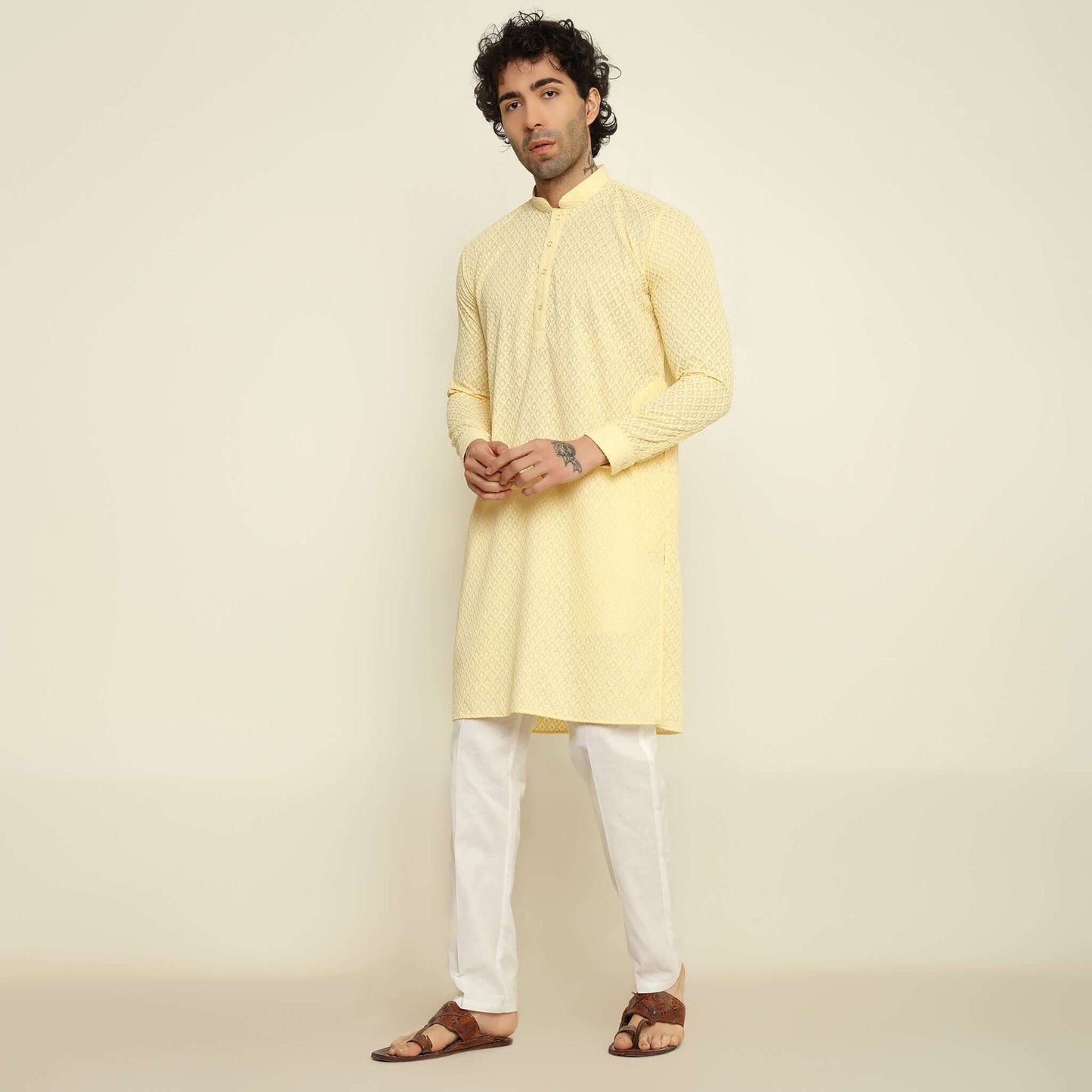 NAQSH Light Yellow Chikankari Kurta for Men which has chikankari embroidery. Perfect mens light yellow wedding kurta for male by Crease India.