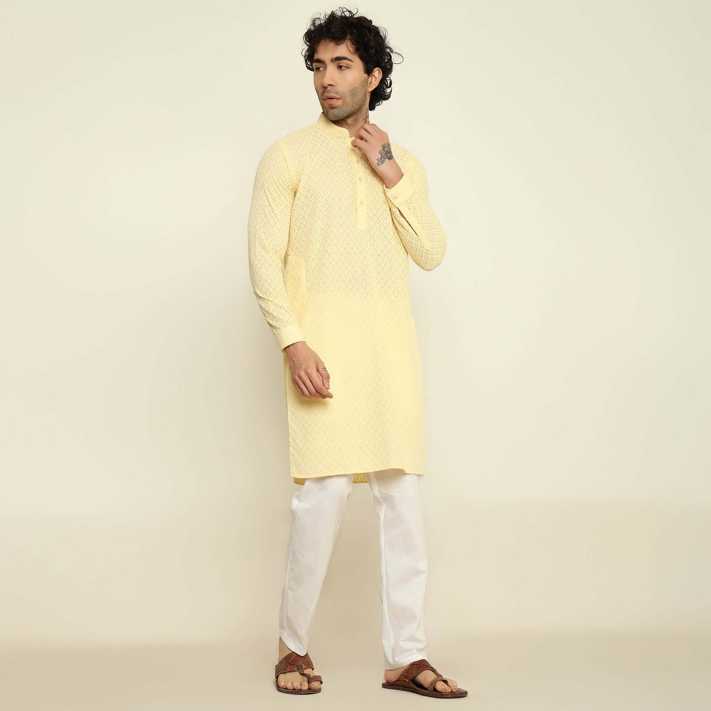 NAQSH Light Yellow Chikankari Kurta for Men which has chikankari embroidery. Perfect mens light yellow wedding kurta for male by Crease India.