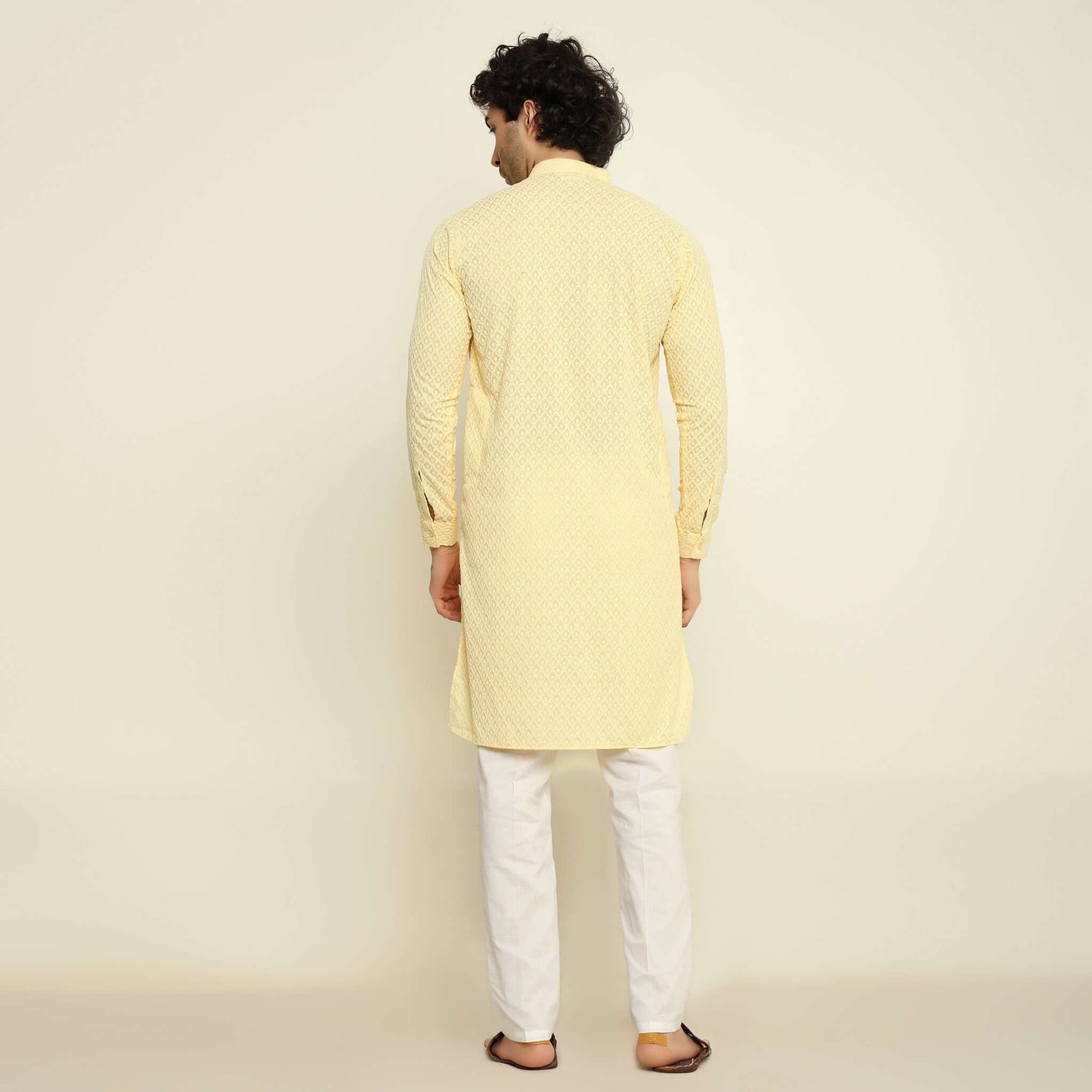 NAQSH Light Yellow Chikankari Kurta for Men which has chikankari embroidery. Perfect mens light yellow wedding kurta for male by Crease India.