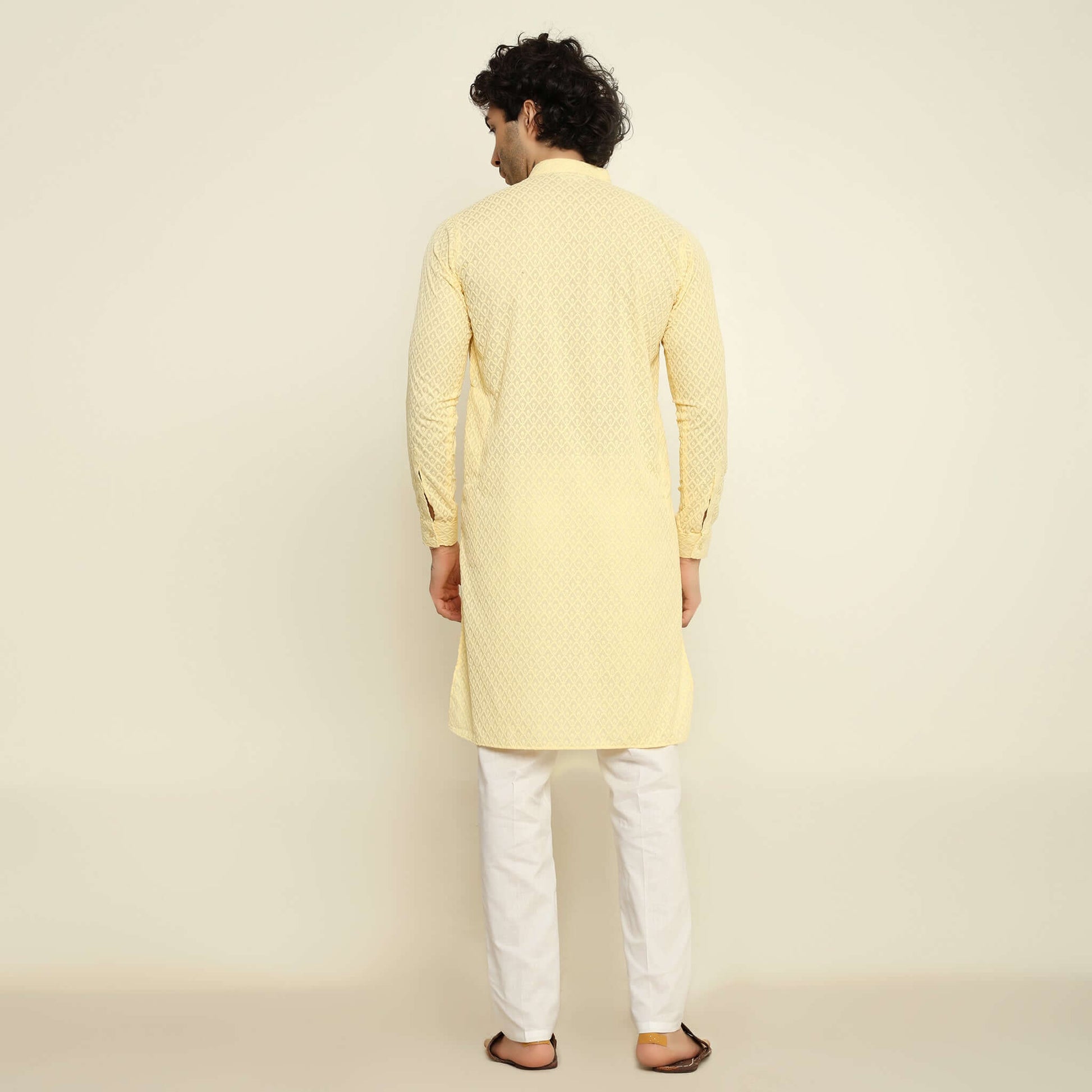 NAQSH Light Yellow Chikankari Kurta for Men which has chikankari embroidery. Perfect mens light yellow wedding kurta for male by Crease India.