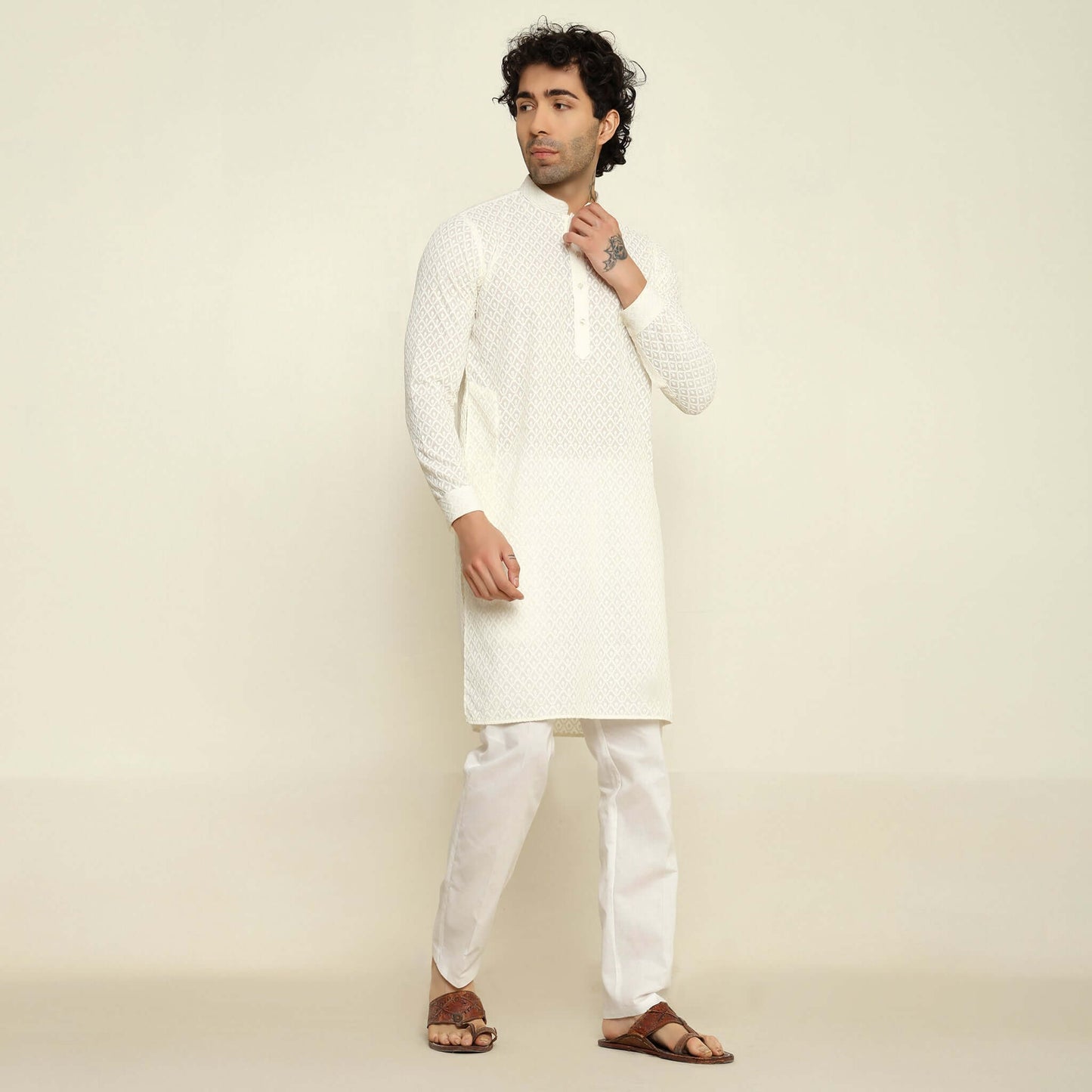 NAQSH Cream Chikankari Kurta for Men which has chikankari embroidery. Perfect mens cream wedding kurta for male by Crease India.
