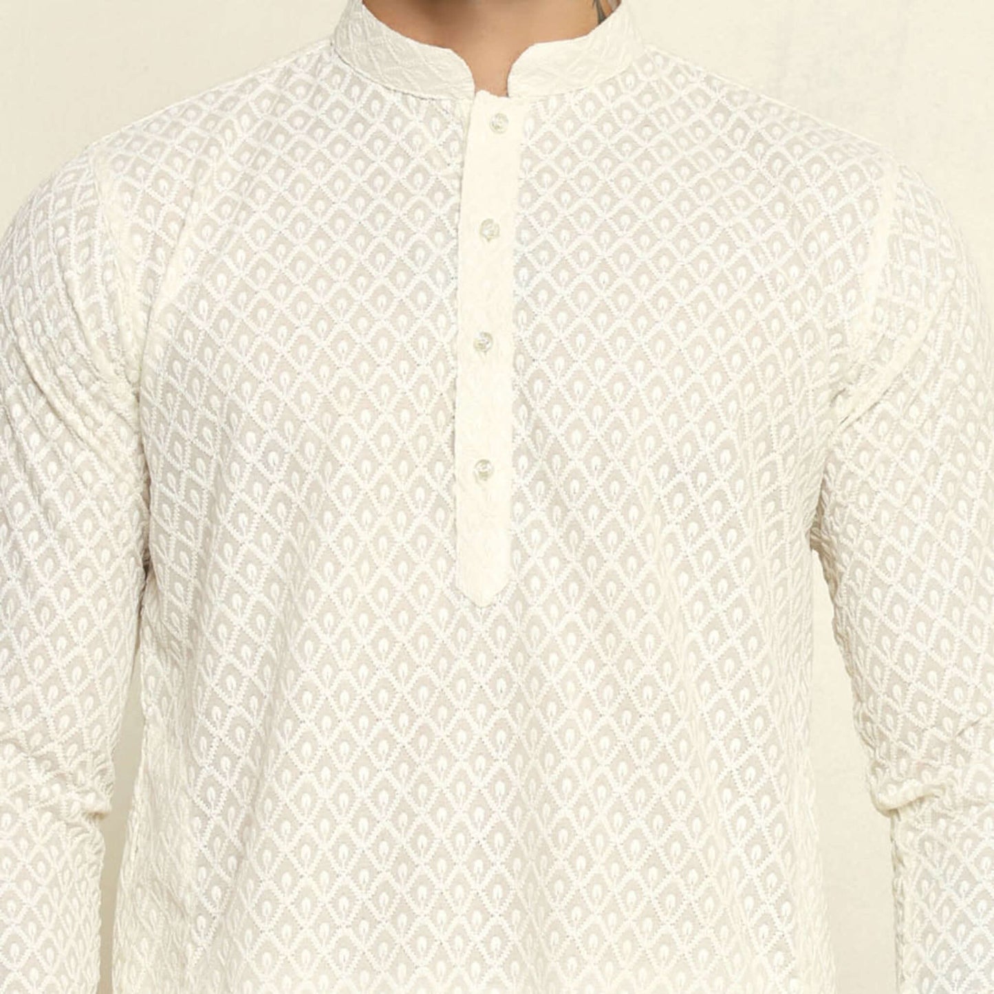 NAQSH Cream Chikankari Kurta for Men which has chikankari embroidery. Perfect mens cream wedding kurta for male by Crease India.