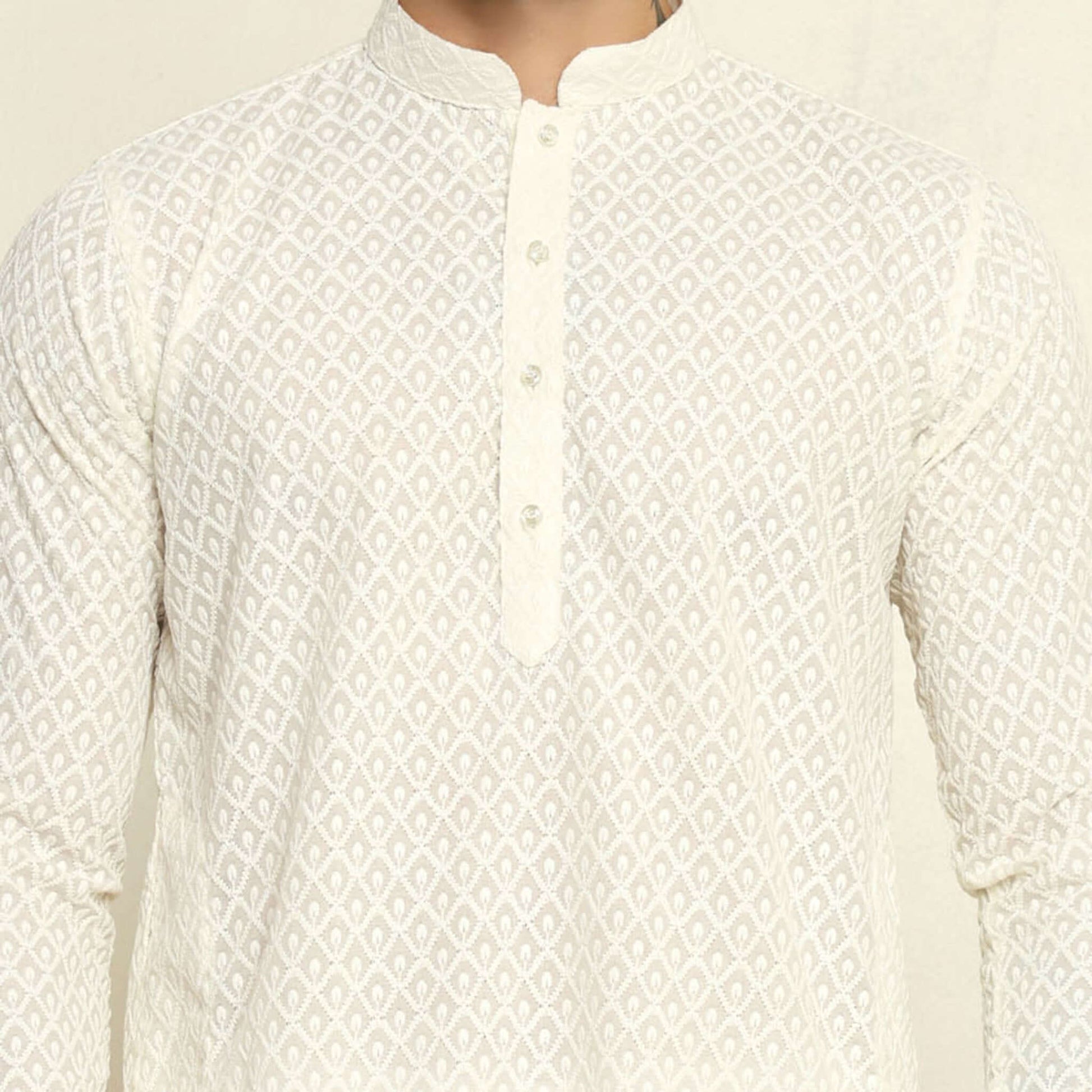 NAQSH Cream Chikankari Kurta for Men which has chikankari embroidery. Perfect mens cream wedding kurta for male by Crease India.