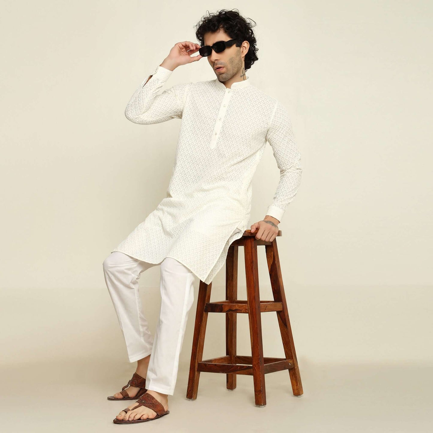 NAQSH Cream Chikankari Kurta for Men which has chikankari embroidery. Perfect mens cream wedding kurta for male by Crease India.