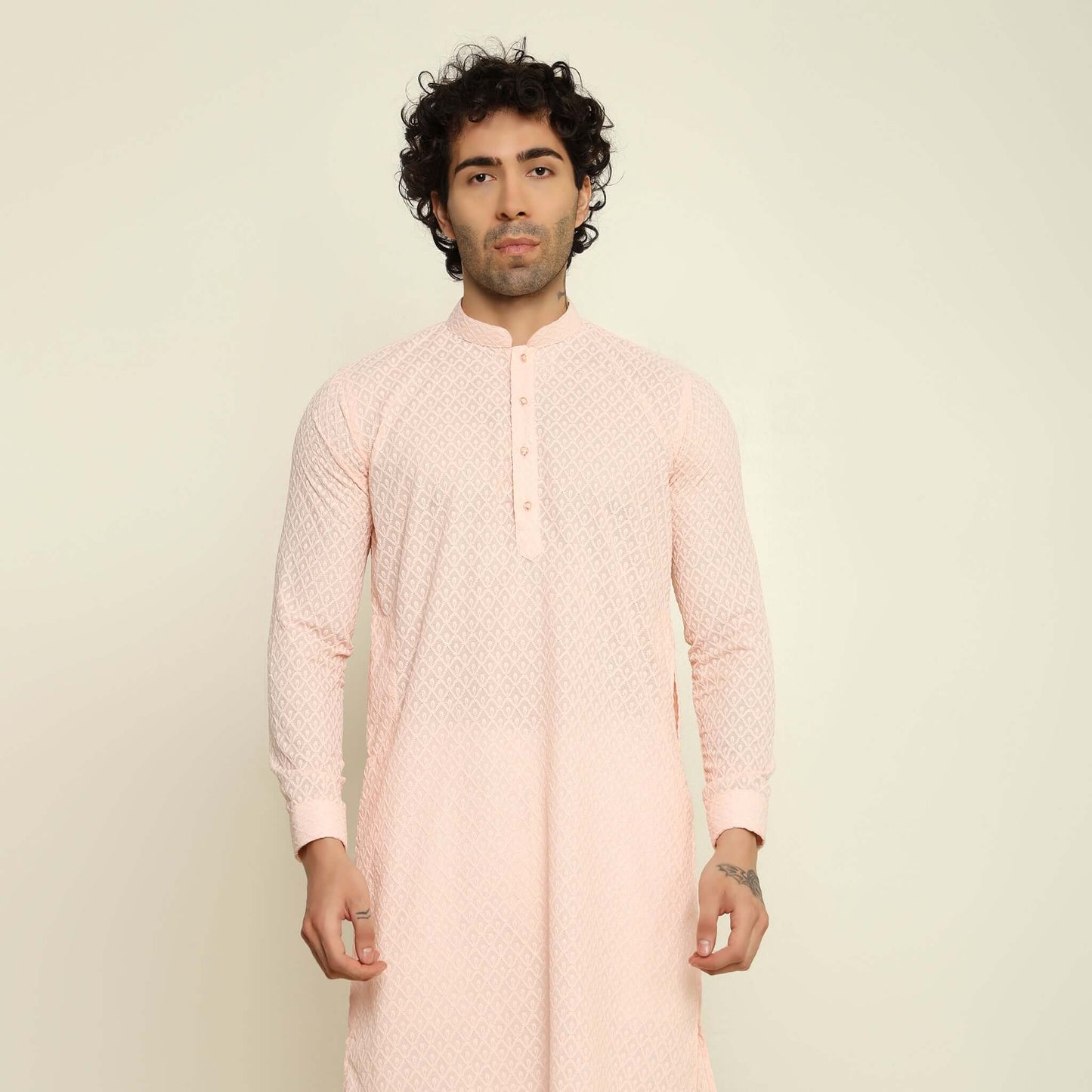 NAQSH Pastel Pink Chikankari Kurta for Men which has chikankari embroidery. Perfect mens pink wedding kurta for male by Crease India.