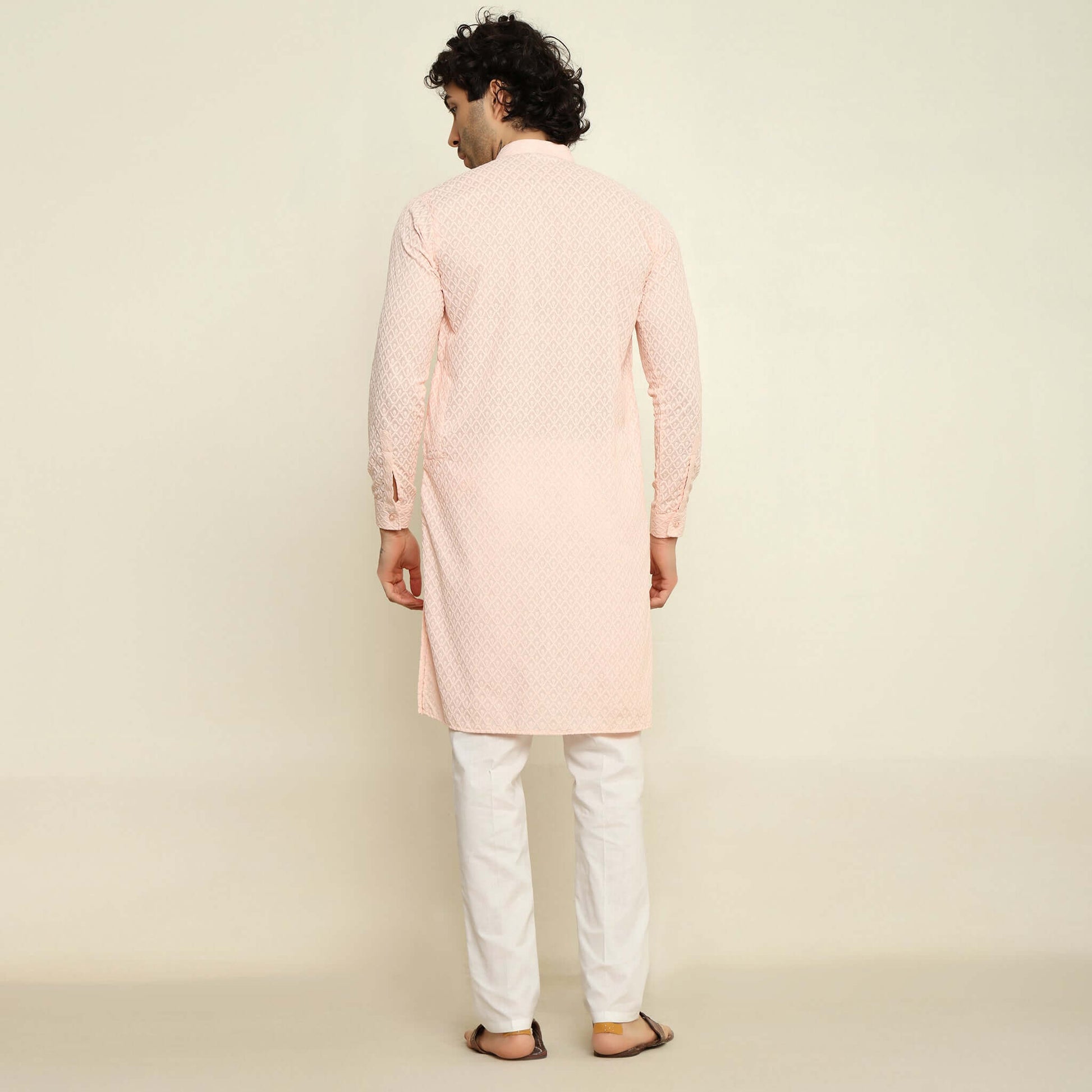 NAQSH Pastel Pink Chikankari Kurta for Men which has chikankari embroidery. Perfect mens pink wedding kurta for male by Crease India.