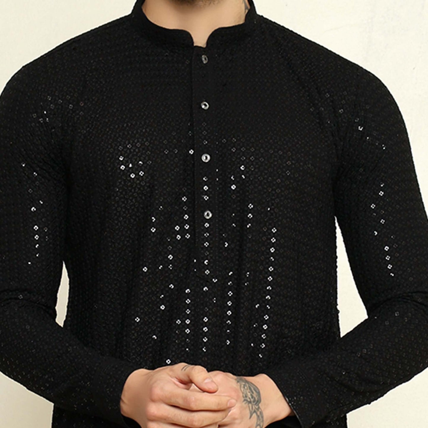 NAQSH Black Sequin Embellished Chikankari Kurta for Men which has chikankari and sequins embellishments. Perfect mens black wedding kurta for male by Crease India.