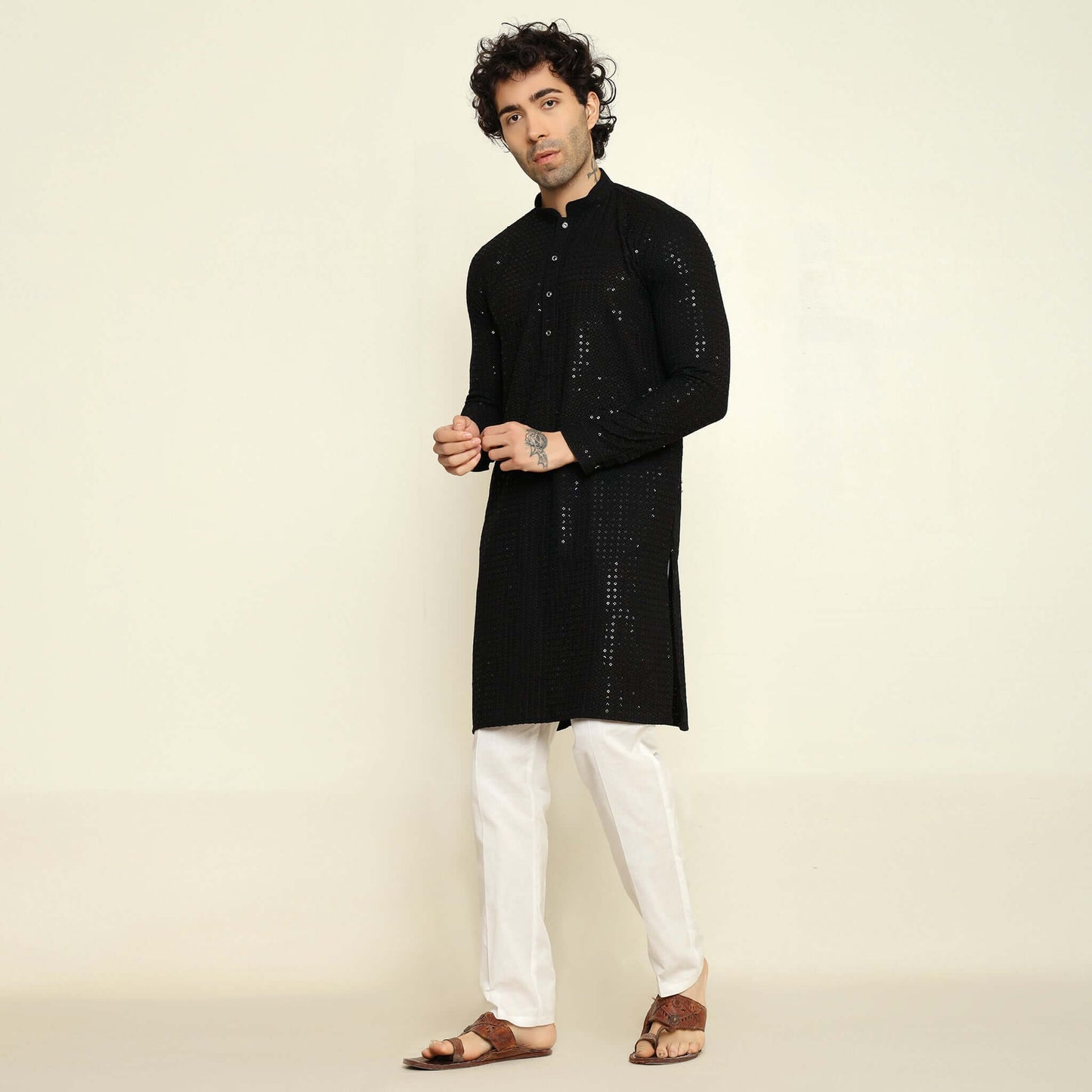 NAQSH Black Sequin Embellished Chikankari Kurta for Men which has chikankari and sequins embellishments. Perfect mens black wedding kurta for male by Crease India.