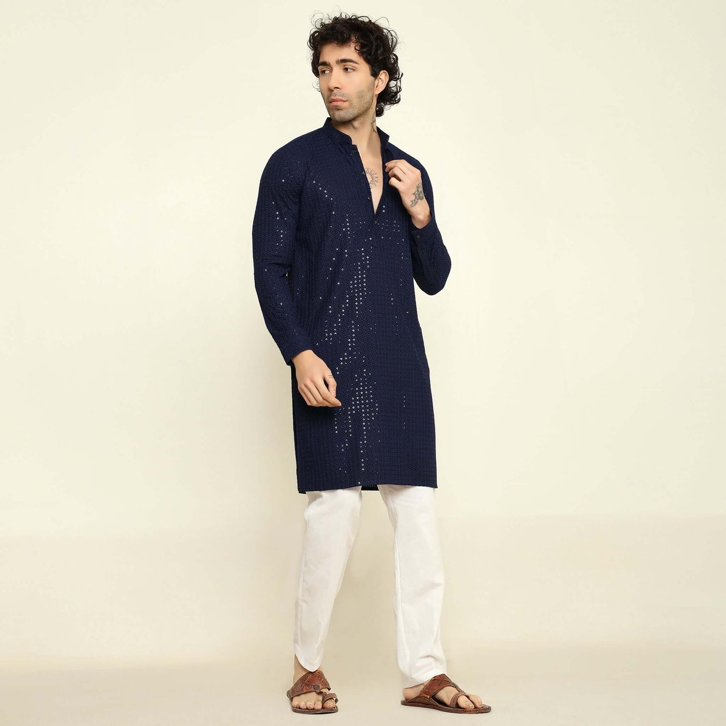 NAQSH Blue Sequin Embellished Chikankari Kurta for Men which has chikankari and sequins embellishments. Perfect mens blue wedding kurta for male by Crease India.