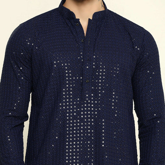 NAQSH Blue Sequin Embellished Chikankari Kurta for Men which has chikankari and sequins embellishments. Perfect mens blue wedding kurta for male by Crease India.