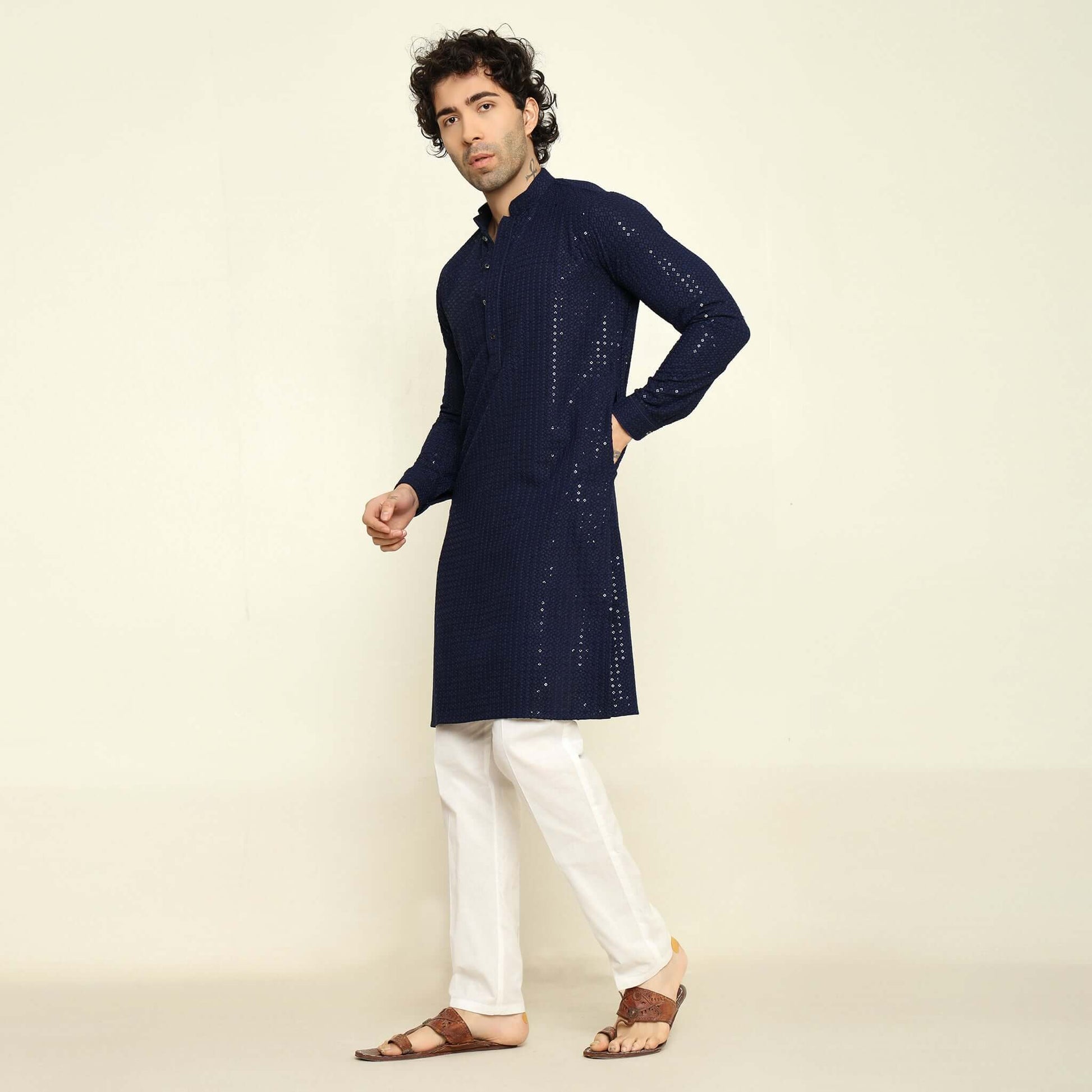 NAQSH Blue Sequin Embellished Chikankari Kurta for Men which has chikankari and sequins embellishments. Perfect mens blue wedding kurta for male by Crease India.