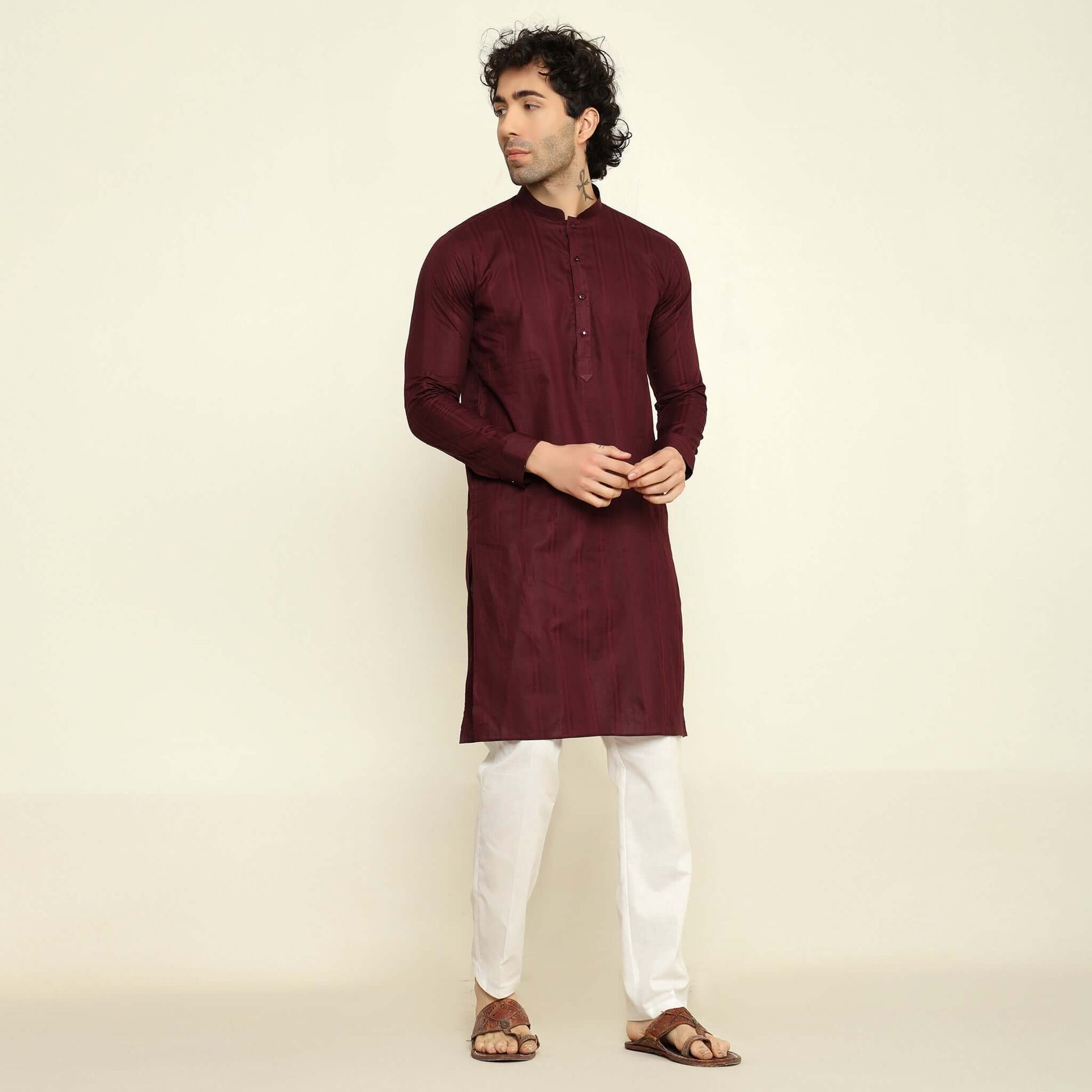 NAQSH Wine Jacquard Cotton Kurta Set for Men which has jacquard design. Perfect mens wine wedding kurta for male by Crease India.