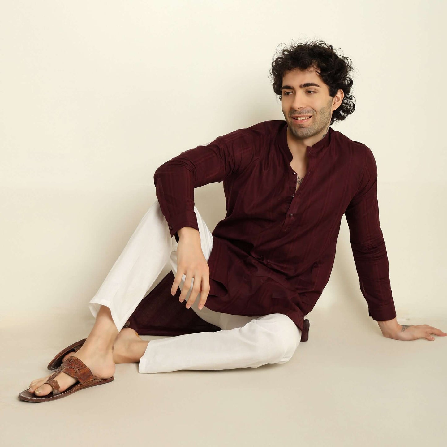 NAQSH Wine Jacquard Cotton Kurta Set for Men which has jacquard design. Perfect mens wine wedding kurta for male by Crease India.