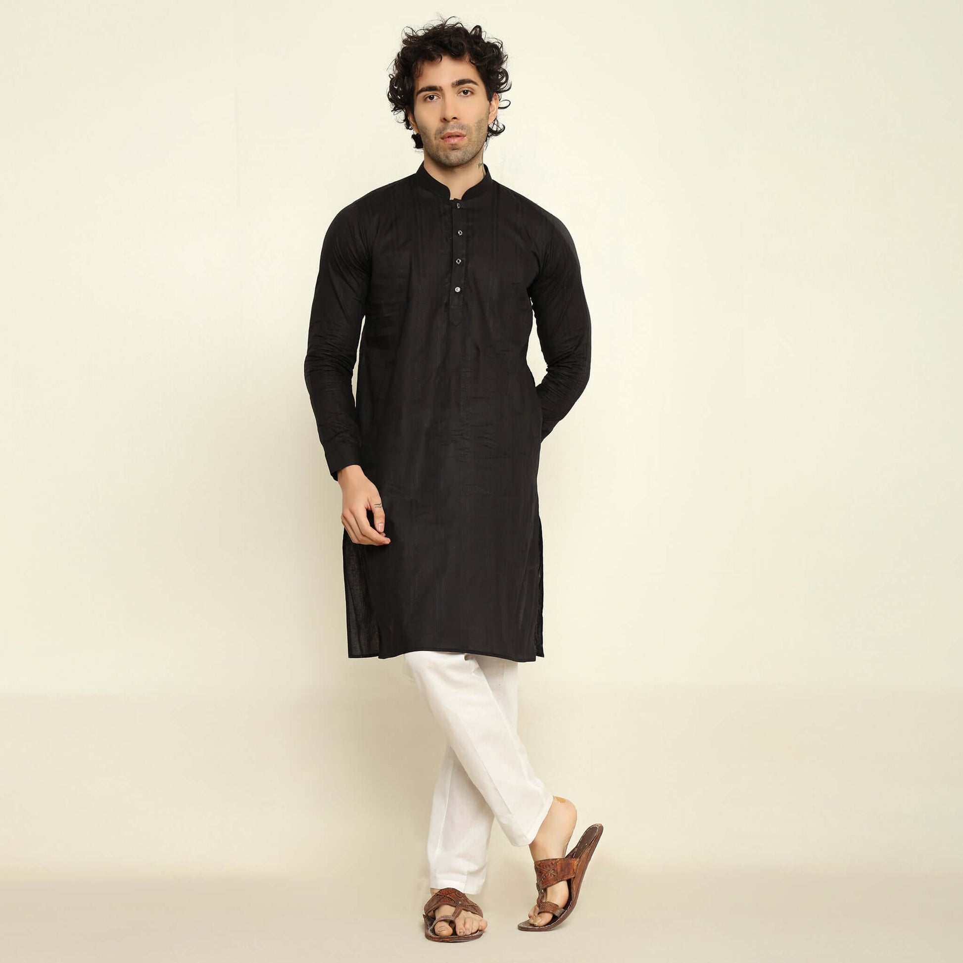 NAQSH Black Jacquard Cotton Kurta Set for Men which has jacquard design. Perfect mens black wedding kurta for male by Crease India.