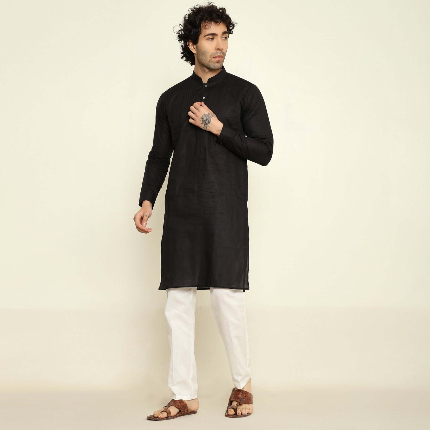 NAQSH Black Jacquard Cotton Kurta Set for Men which has jacquard design. Perfect mens black wedding kurta for male by Crease India.