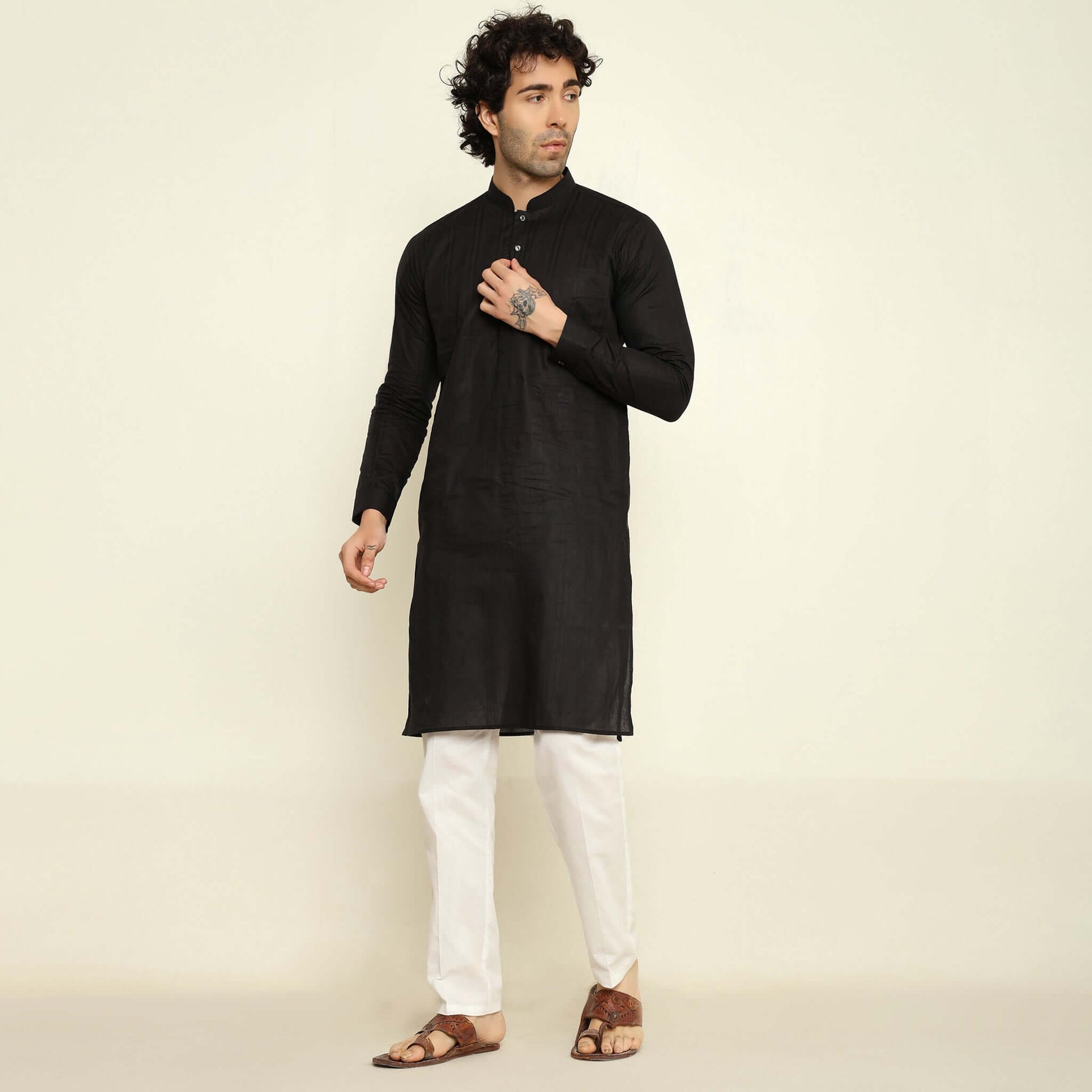NAQSH Black Jacquard Cotton Kurta Set for Men which has jacquard design. Perfect mens black wedding kurta for male by Crease India.