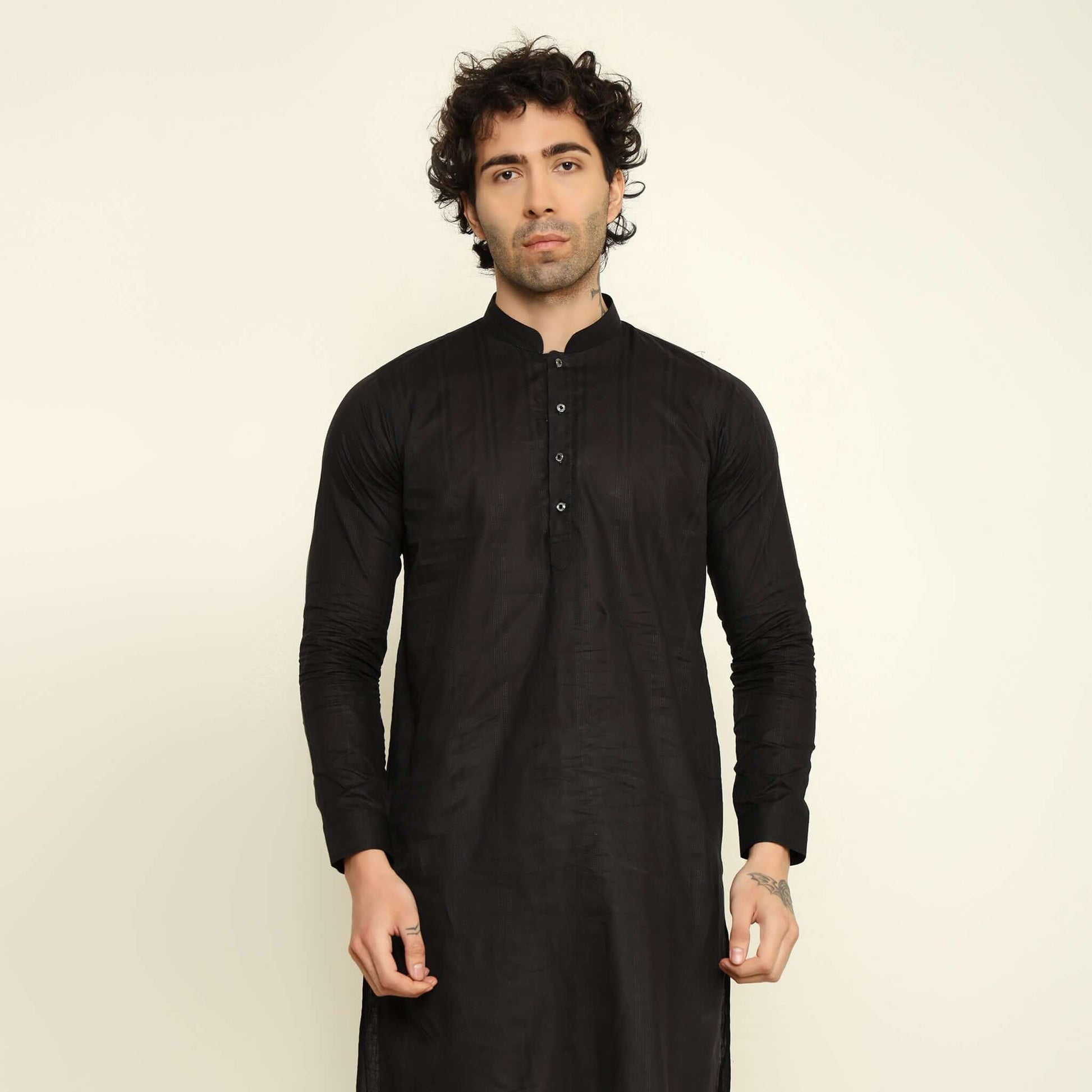 NAQSH Black Jacquard Cotton Kurta Set for Men which has jacquard design. Perfect mens black wedding kurta for male by Crease India.