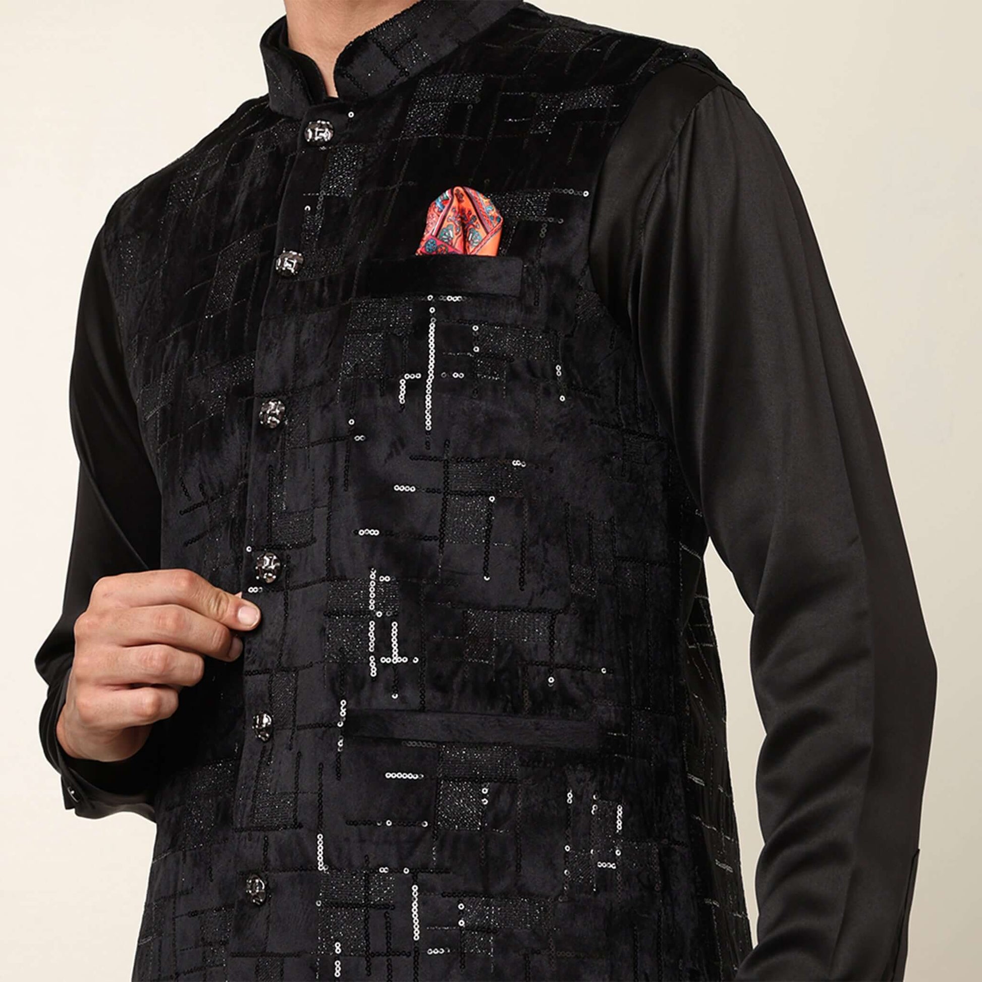 Black kurta with black nehru jacket for men which is made up of suede and has sequence embroidery on it. Shop this black designer wedding kurta jacket set for male from Crease India website.