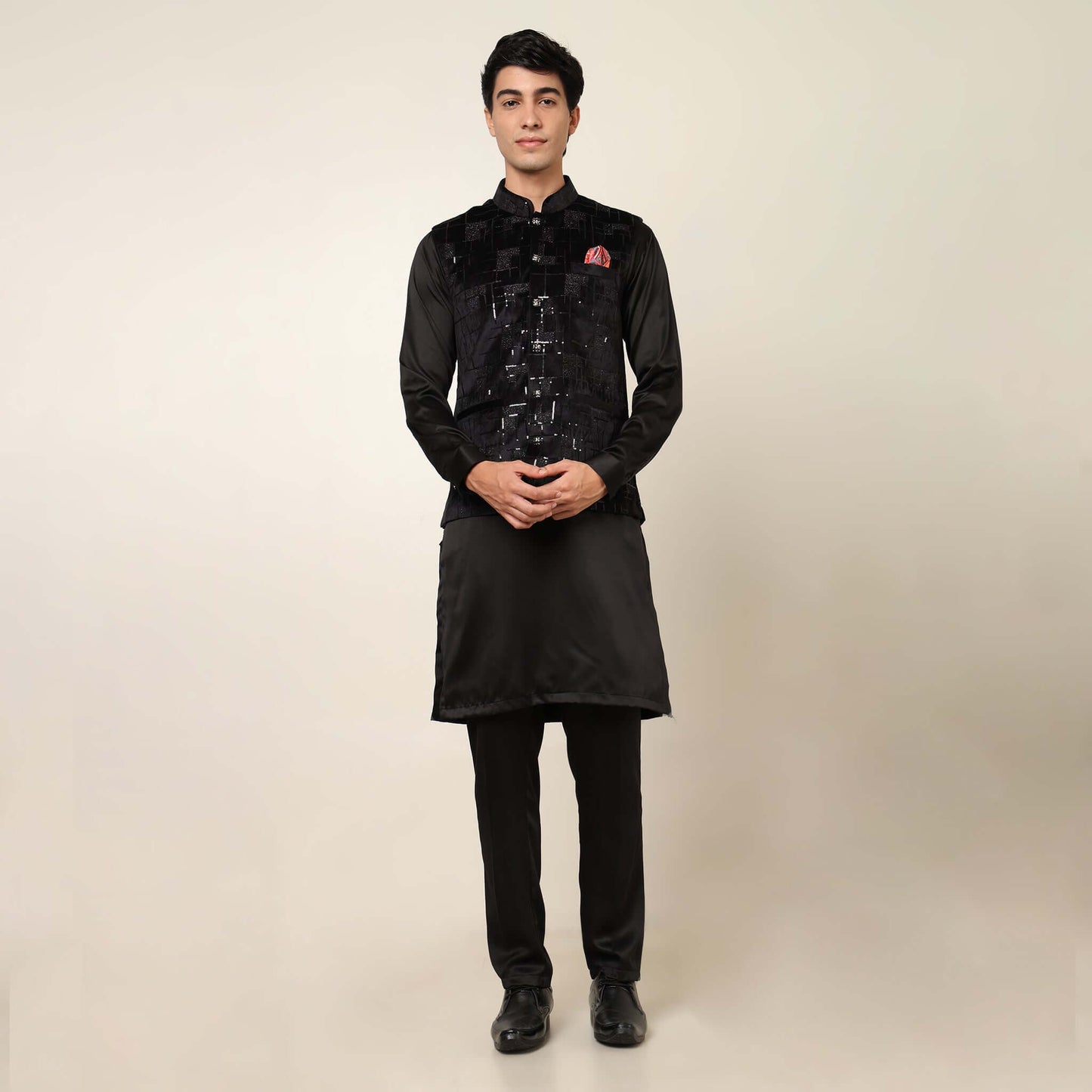 Black kurta with black nehru jacket for men which is made up of suede and has sequence embroidery on it. Shop this black designer wedding kurta jacket set for male from Crease India website.