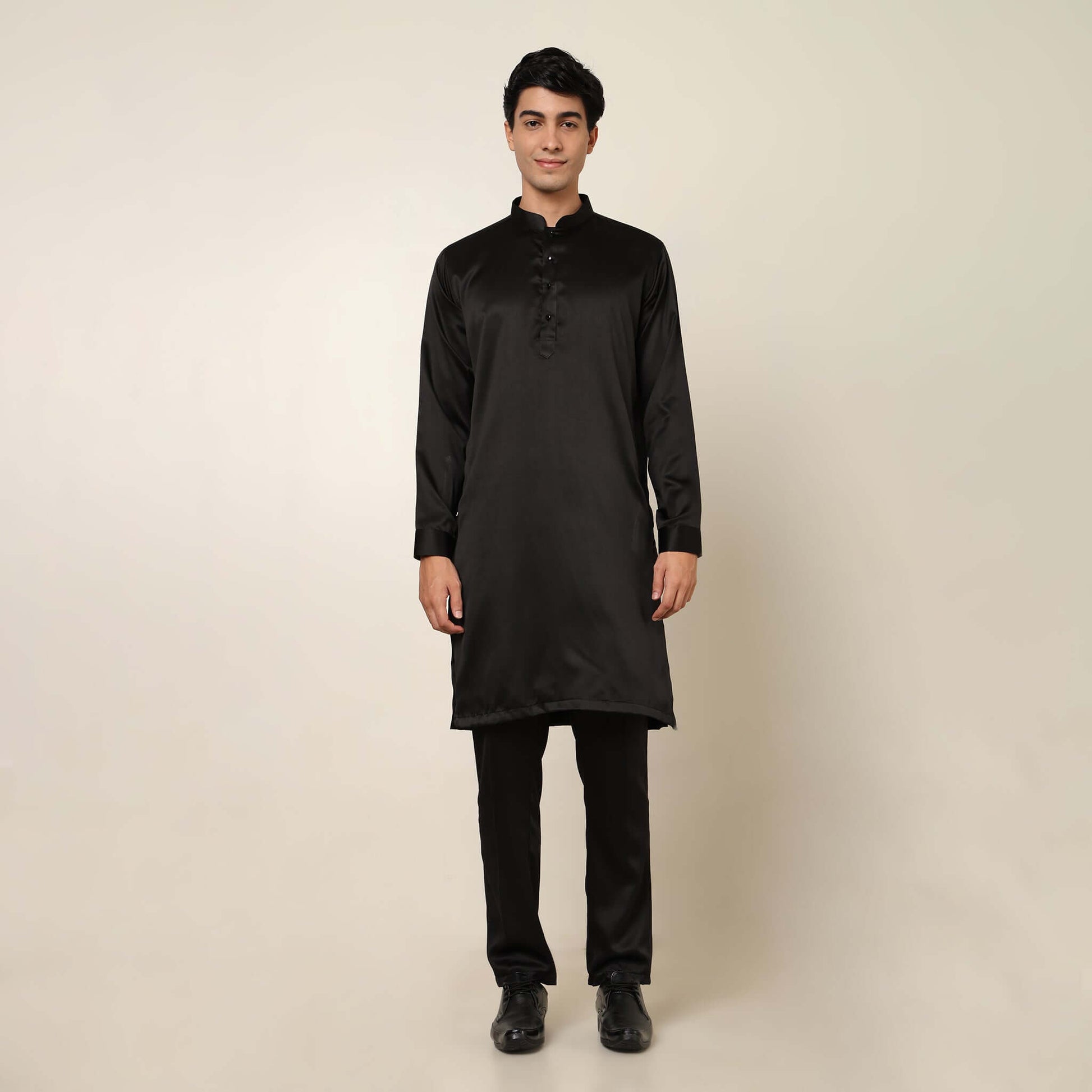 Black kurta with black nehru jacket for men which is made up of suede and has sequence embroidery on it. Shop this black designer wedding kurta jacket set for male from Crease India website.