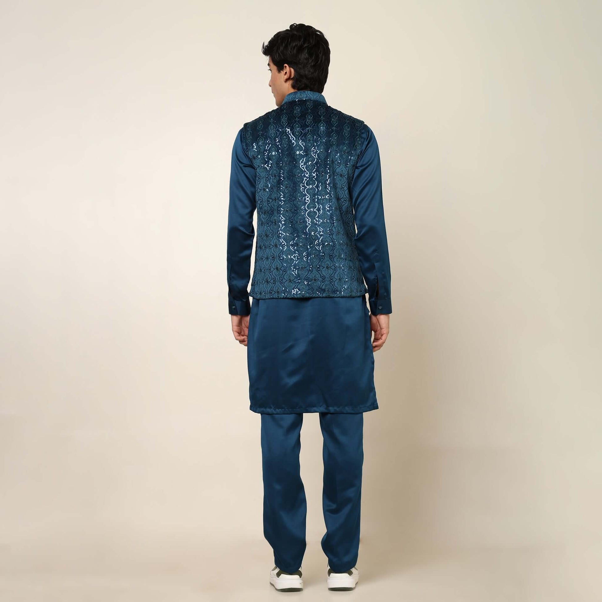 Navy Blue kurta with nehru jacket for men which is made up of suede and has sequence embroidery on it. Shop this navy blue designer wedding kurta jacket set for male from Crease India website.