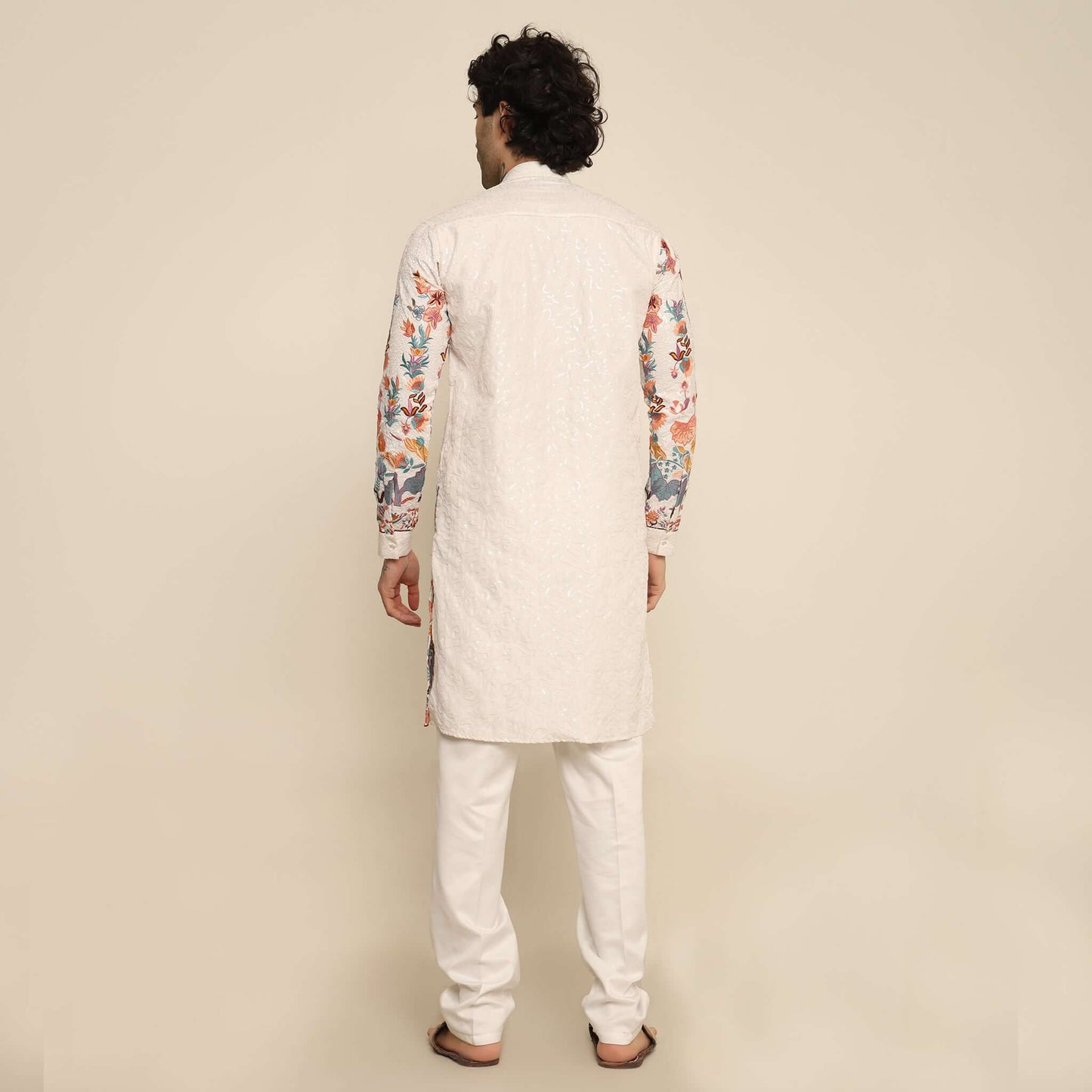 White Floral Embroidered Kurta for Men which has tiger motif & floral embroidery. Perfect mens wedding kurta for male by Crease India.