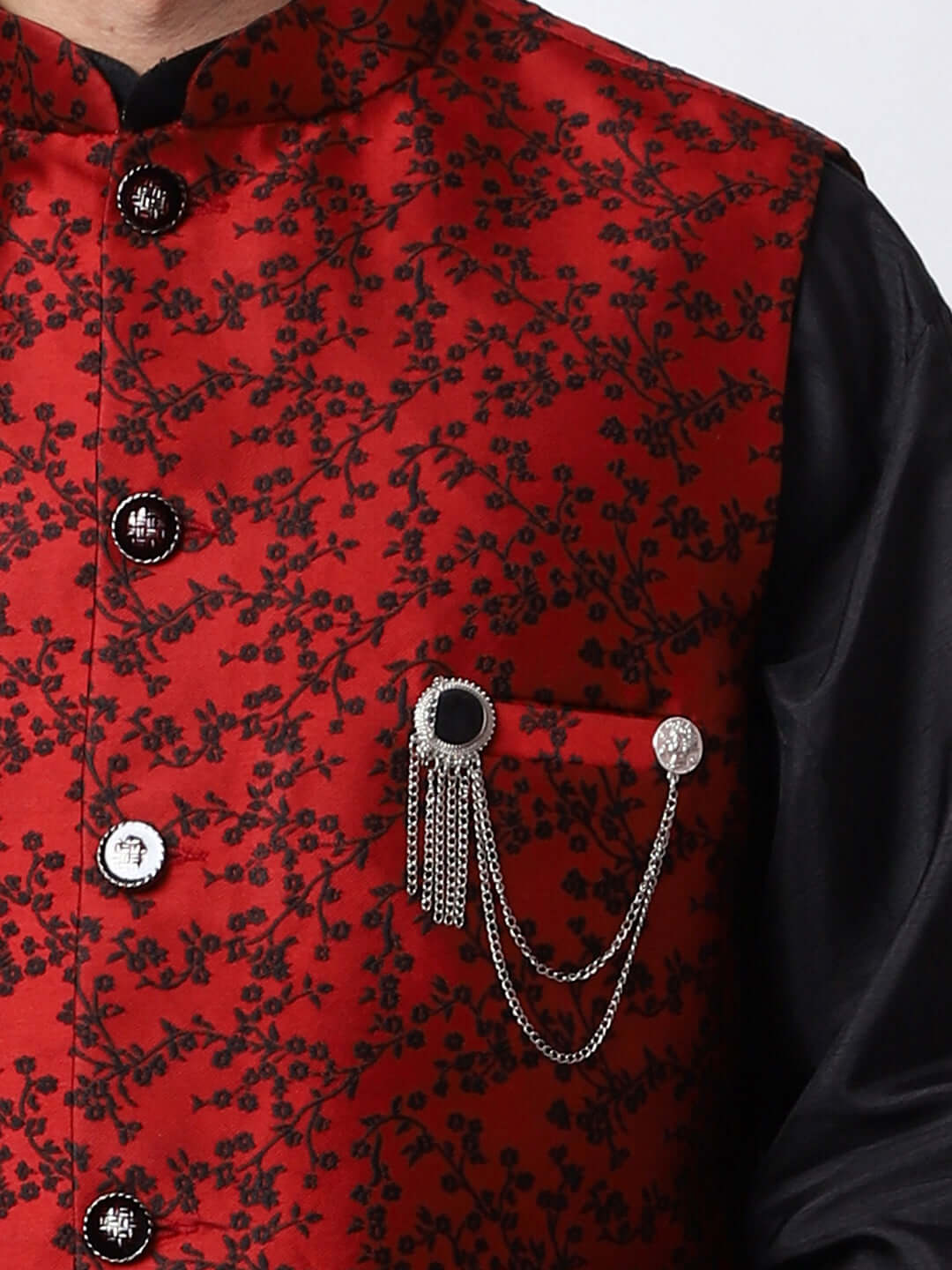 Black kurta with red nehru jacket for men which is made up of jacquard silk and has floral embroidery on it. Shop this black designer wedding kurta jacket set for male from Crease India website.