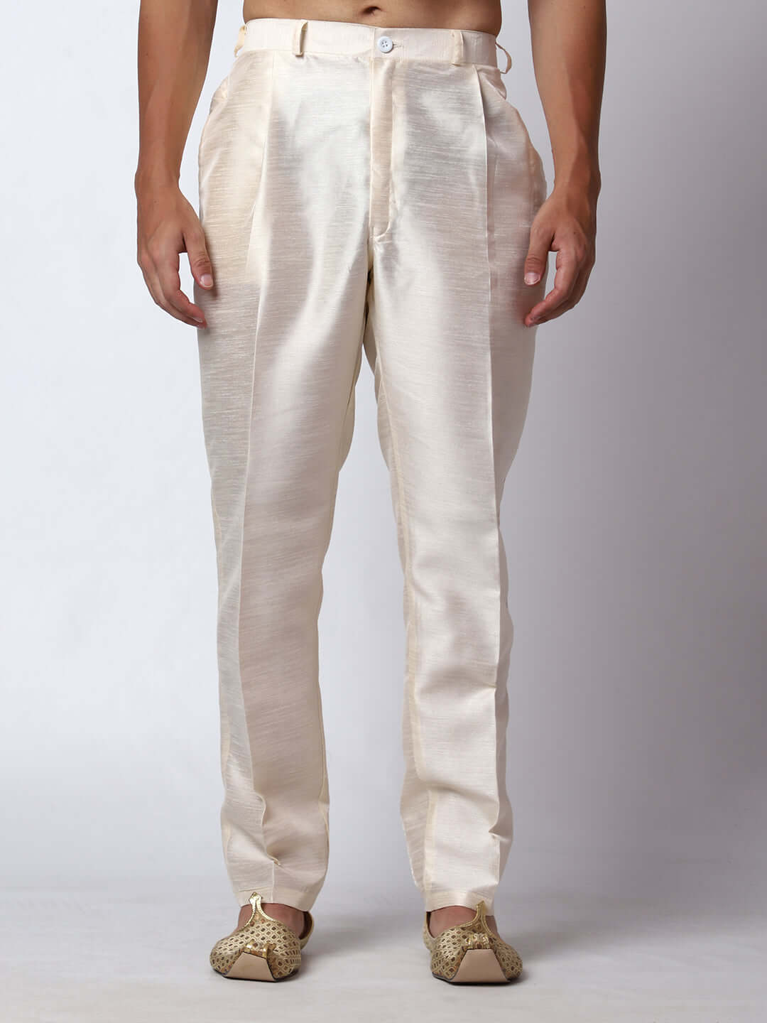 Cream kurta with nehru jacket for men which is made up of dupion silk and has multicolored thread embroidery on it. Shop this cream designer wedding kurta jacket set for male from Crease India website.