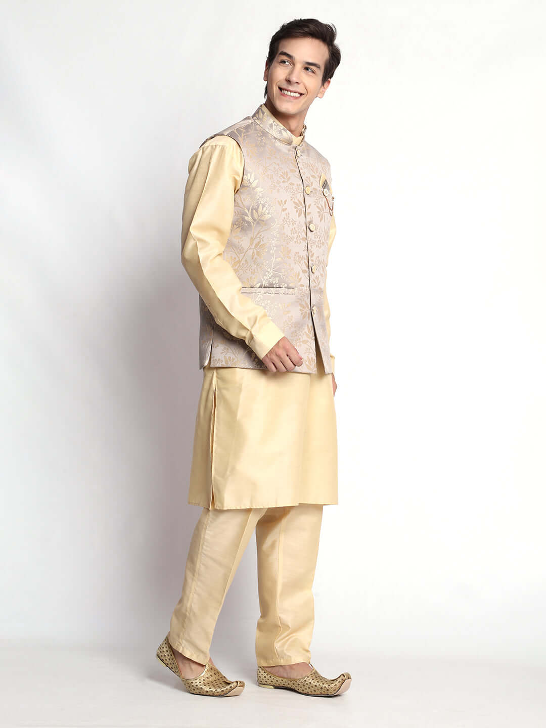 Fawn kurta with grey nehru jacket for men which is made up of satin and has floral embroidery on it. Shop this fawn designer wedding kurta jacket set for male from Crease India website.