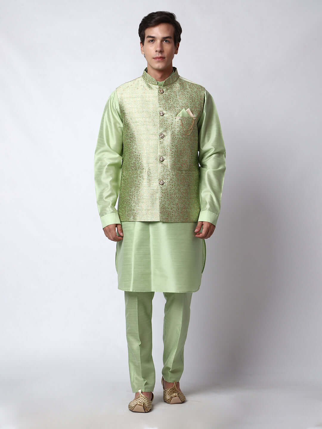 Lush Green kurta with nehru jacket for men which is made up of dupion silk and has golden petal embroidery on it. Shop this lush green designer wedding kurta jacket set for male from Crease India website.