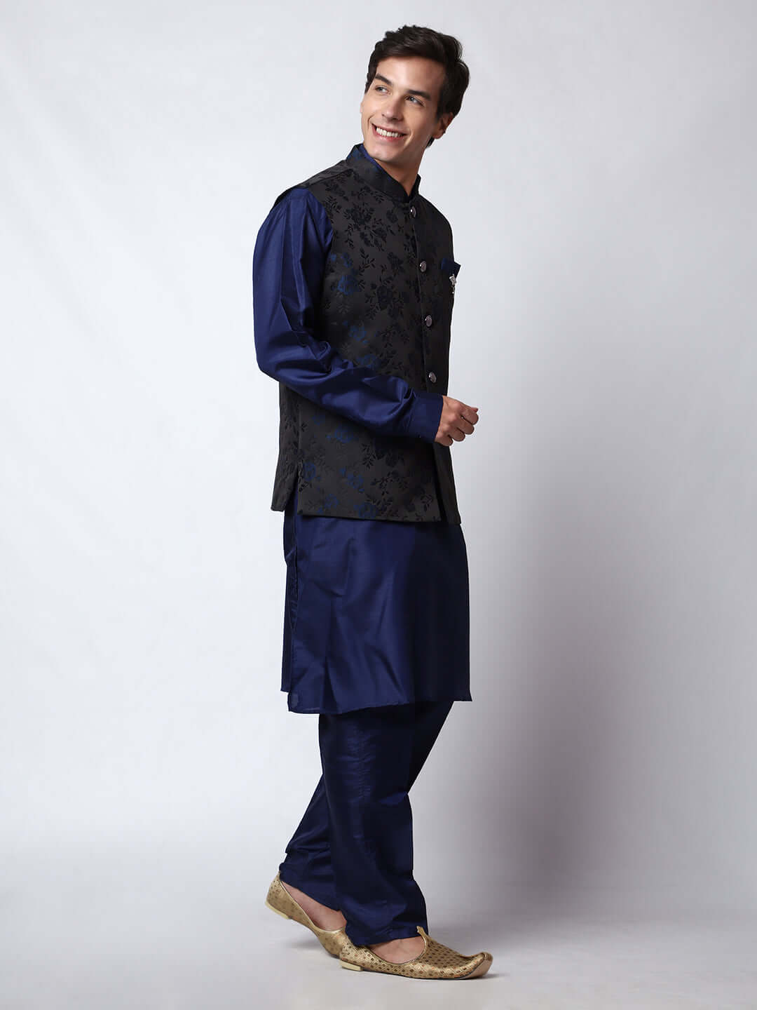 Navy Blue kurta with black nehru jacket for men which is made up of jacquard silk and has floral embroidery on it. Shop this navy blue designer wedding kurta jacket set for male from Crease India website.